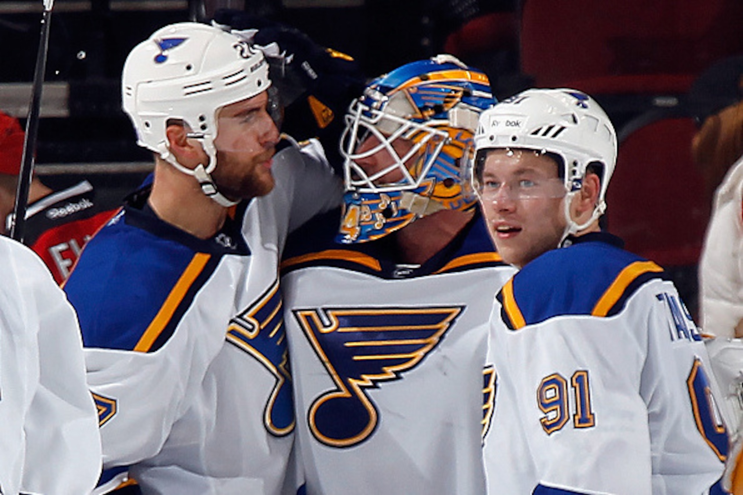 NEWARK, NJ - NOVEMBER 04: (l-r) Alex Pietrangelo #27, Jake Allen #34 and Vladimir Tarasenko #91 of the St. Louis Blues celebrate a 1-0 shutout victory over the New Jersey Devils at the Prudential Center on November 4, 2014 in Newark, New Jersey.  (Photo b