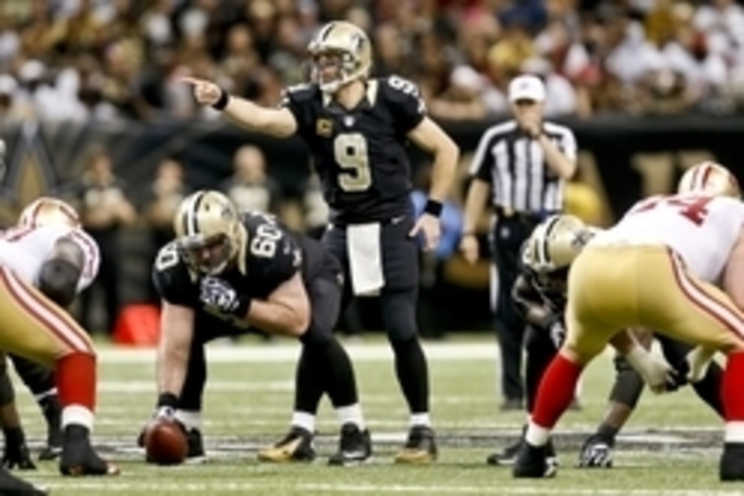 Nov 17, 2013; New Orleans, LA, USA; New Orleans Saints quarterback Drew Brees (9) against the San Francisco 49ers during the fourth quarter of a game at Mercedes-Benz Superdome. The Saints defeated the 49ers 23-20. Mandatory Credit: Derick E. Hingle-USA T