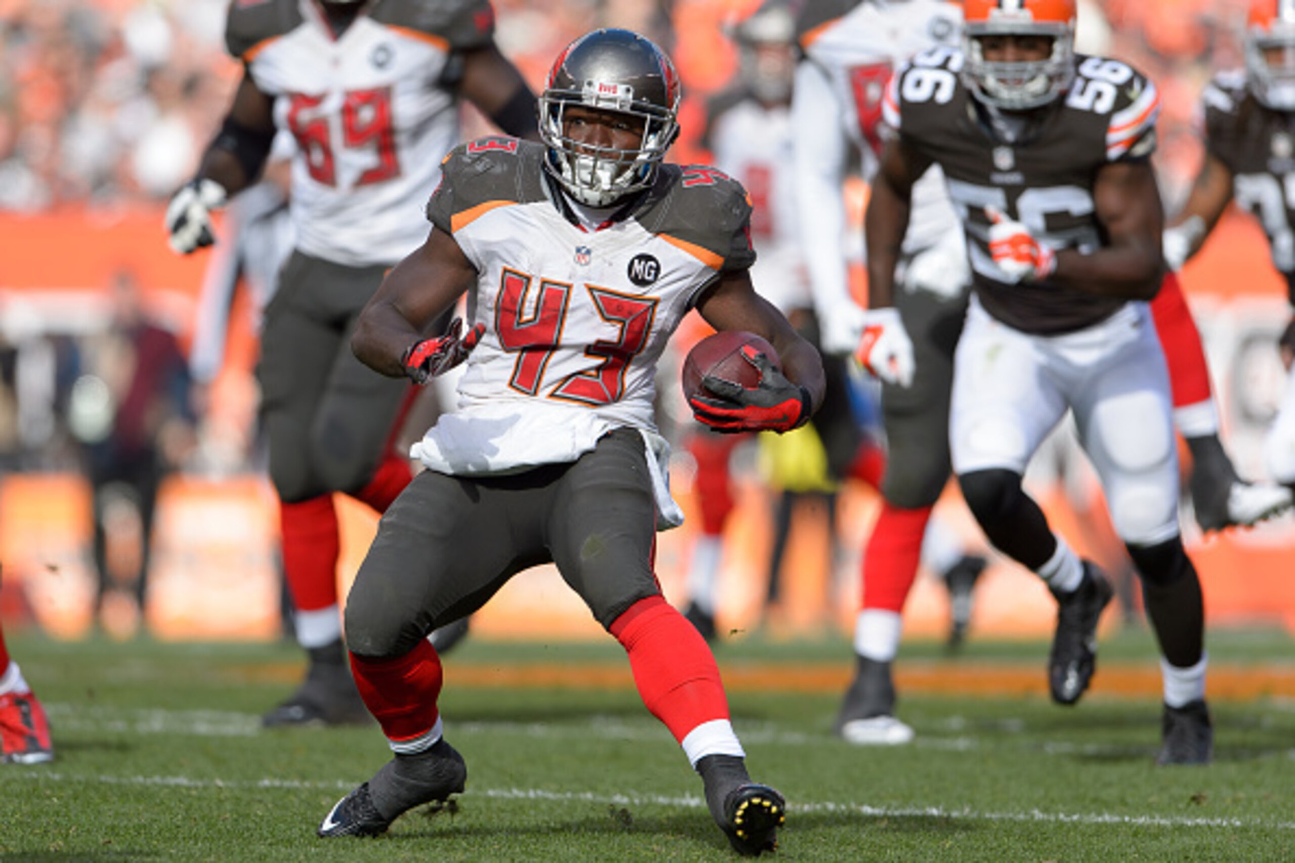 CLEVELAND, OH - NOVEMBER 2: Running back Bobby Rainey #43 of the Tampa Bay Buccaneers runs for a gain during the first half against the Cleveland Browns at FirstEnergy Stadium on November 2, 2014 in Cleveland, Ohio. (Photo by Jason Miller/Getty Images)