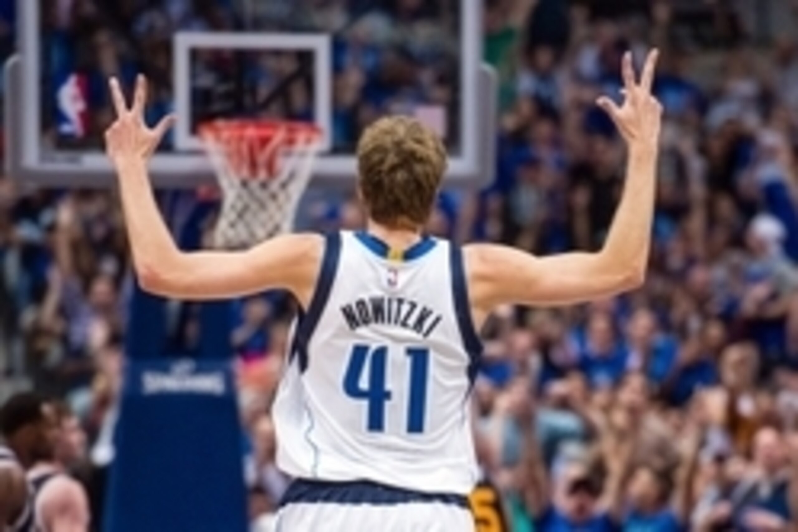 Oct 30, 2014; Dallas, TX, USA; Dallas Mavericks forward Dirk Nowitzki (41) celebrates making a three point shot against the Utah Jazz during the second half at the American Airlines Center. The Mavericks defeated the Jazz 120-102. Mandatory Credit: Jerome