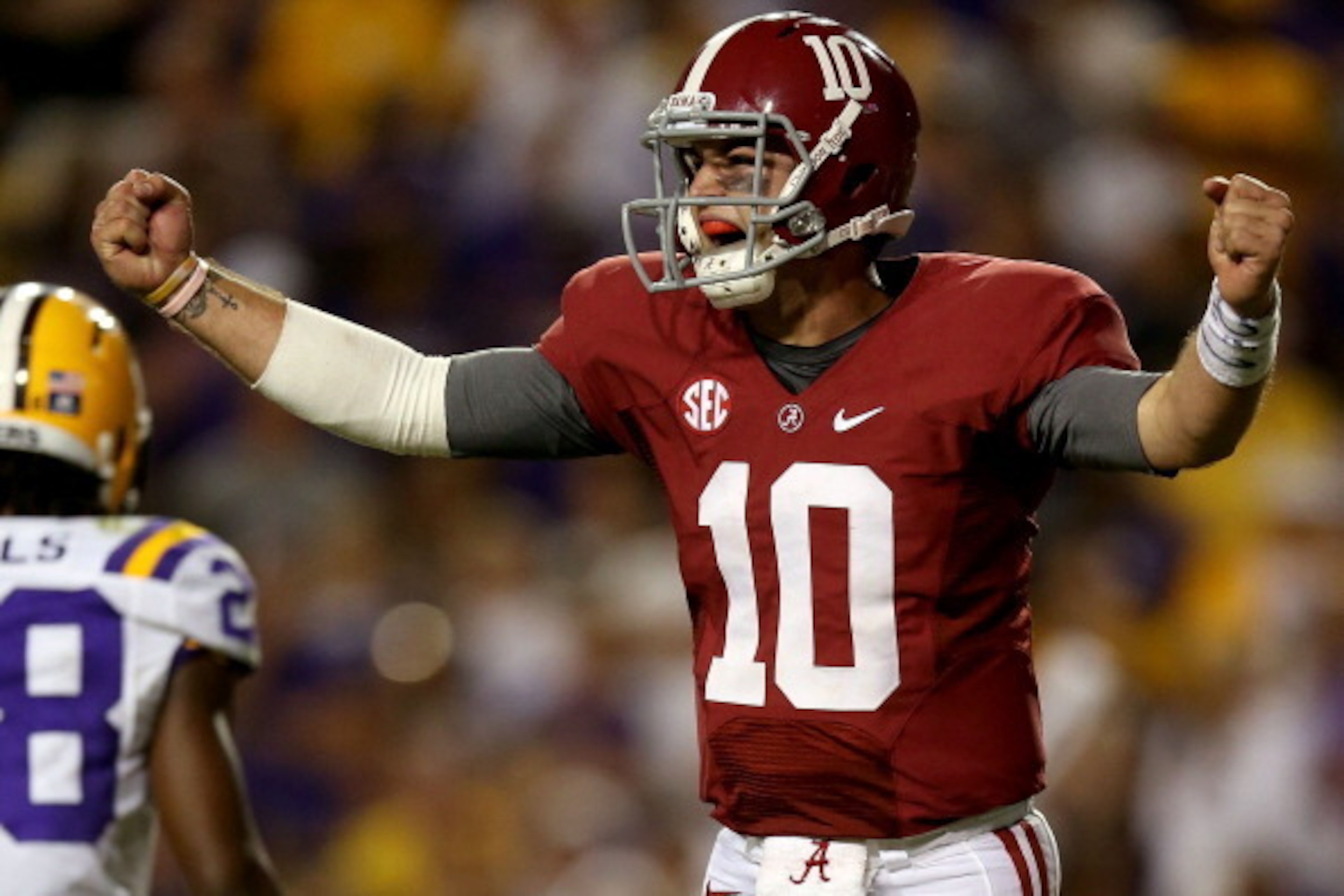 BATON ROUGE, LA - NOVEMBER 03:  Quarterback AJ McCarron #10 of Alabama celebratesw after the extra point for the go ahead touchdown against LSU late in the fourth quarter at Tiger Stadium on November 3, 2012 in Baton Rouge, Louisiana.  (Photo by Matthew S