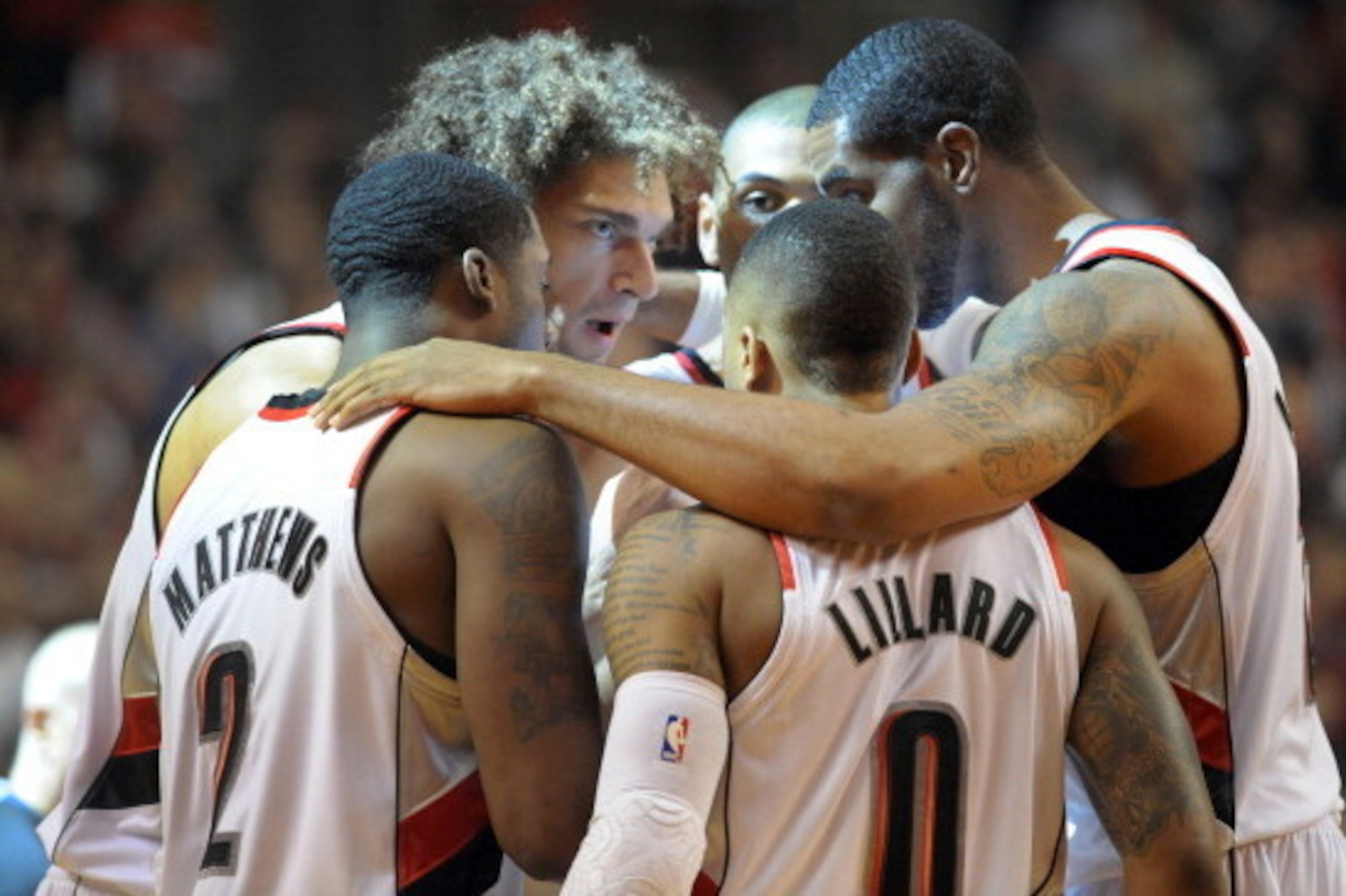 PORTLAND, OR - APRIL 25: The Portland Trail Blazers starting five, Wesley Matthews #2, Damian Lillard #0, LaMarcus Aldridge #12, Nicolas Batum #88 and Robin Lopez #42 huddle before Game Three of the Western Conference Quarterfinals during the 2014 NBA Pl PORTLAND, OR - APRIL 25: The Portland Trail Blazers starting five, Wesley Matthews #2, Damian Lillard #0, LaMarcus Aldridge #12, Nicolas Batum #88 and Robin Lopez #42 huddle before Game Three of the Western Conference Quarterfinals during the 2014 NBA Pl