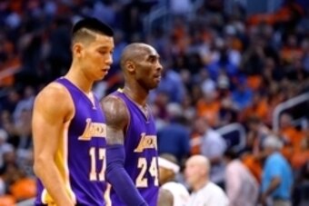 Oct 29, 2014; Phoenix, AZ, USA; Los Angeles Lakers guard Kobe Bryant (right) with guard Jeremy Lin against the Phoenix Suns during the home opener at US Airways Center. The Suns defeated the Lakers 119-99. Mandatory Credit: Mark J. Rebilas-USA TODAY Sport