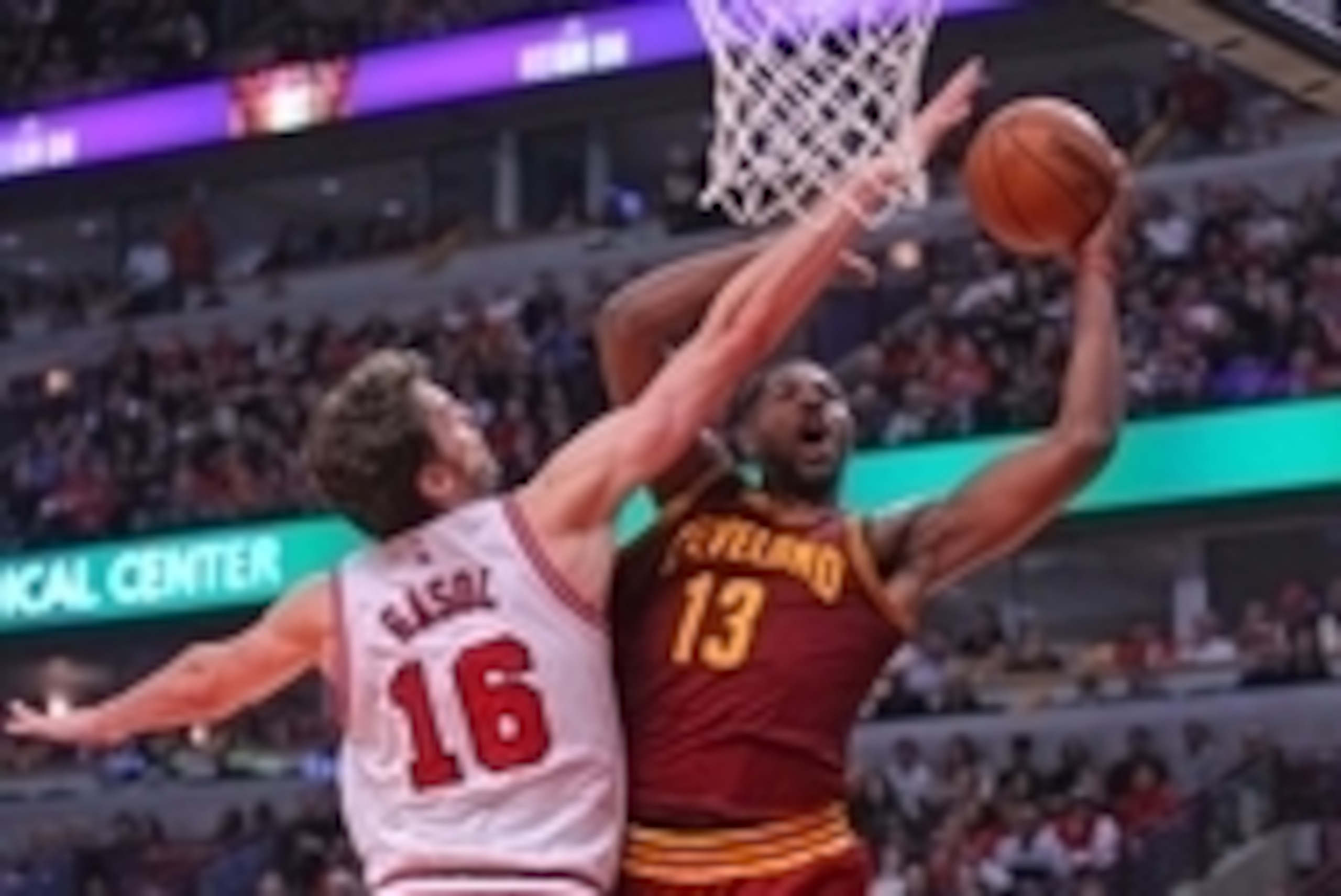 Oct 31, 2014; Chicago, IL, USA; Cleveland Cavaliers forward Tristan Thompson (13) scores past Chicago Bulls forward Pau Gasol (16) during the second half at the United Center. Cleveland won 114-108 in overtime. Mandatory Credit: Dennis Wierzbicki-USA TODA