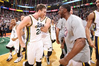 SALT LAKE CITY, UT - NOVEMBER 5:  Gordon Hayward #20 of the Utah Jazz celebrates with teammates after his game-winning basket gave the Jazz a 102-100 win over the Cleveland Cavaliers at EnergySolutions Arena on November 5, 2014 in Salt Lake City, Utah. NO