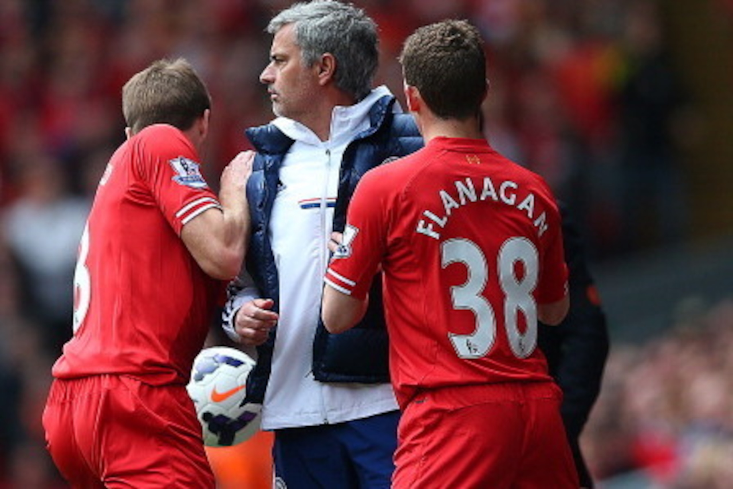 LIVERPOOL, ENGLAND - APRIL 27: Steven Gerrard and Jon Flanagan of Liverpool have words with Jose Mourinho manager of Chelsea as they retrieve the ball to take a Liverpool throw in during the Barclays Premier League match between Liverpool and Chelsea at LIVERPOOL, ENGLAND - APRIL 27: Steven Gerrard and Jon Flanagan of Liverpool have words with Jose Mourinho manager of Chelsea as they retrieve the ball to take a Liverpool throw in during the Barclays Premier League match between Liverpool and Chelsea at