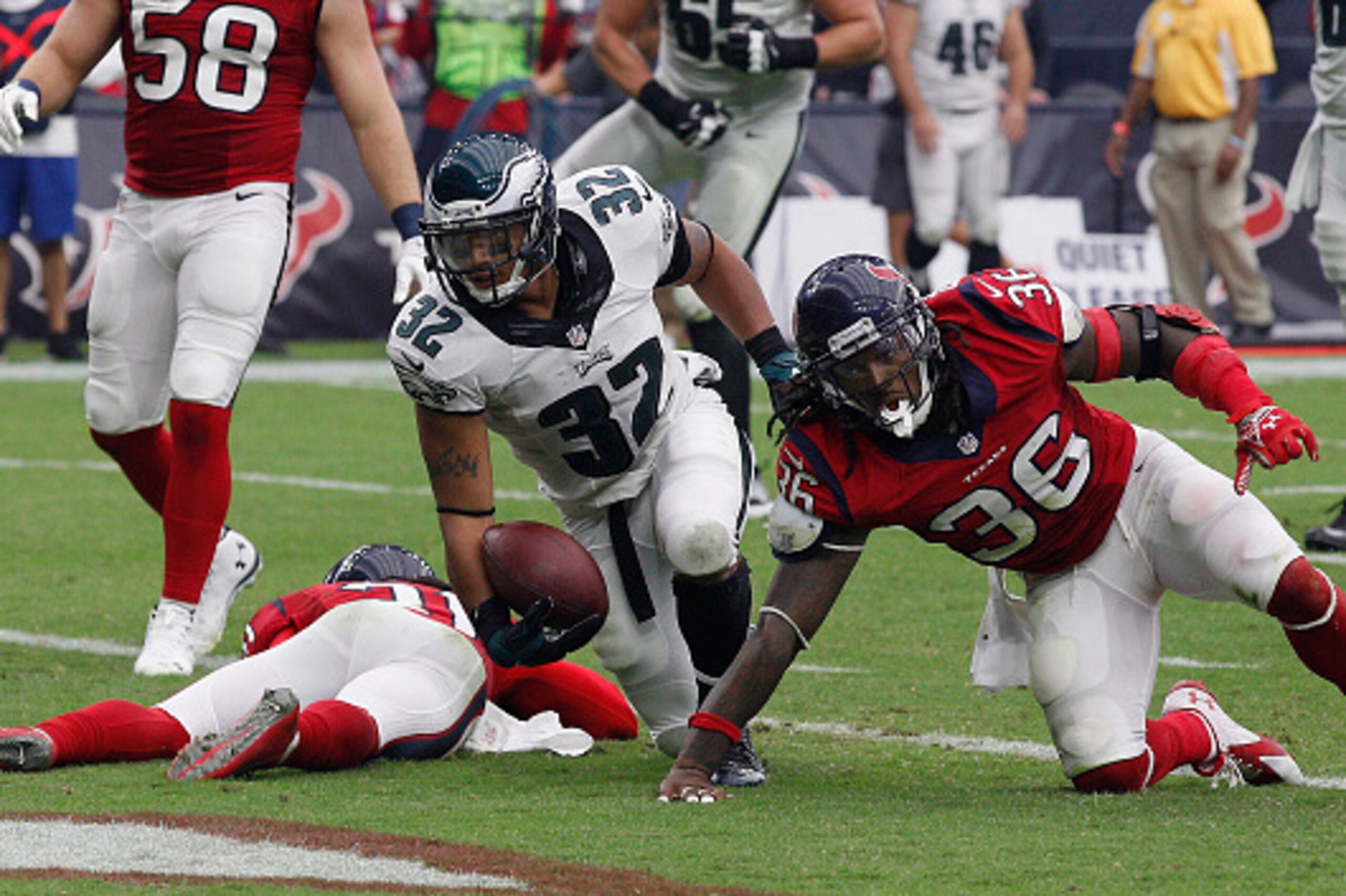 HOUSTON, TX - NOVEMBER 02:  Chris Polk #32 of the Philadelphia Eagles scores as D.J. Swearinger #36 of the Houston Texans is unable to keep him out of the endzone at Reliant Stadium on November 2, 2014 in Houston, Texas.  (Photo by Bob Levey/Getty Images)
