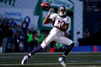 SEATTLE, WA - SEPTEMBER 21: Wide receiver Emmanuel Sanders #10 of the Denver Broncos catches the ball during the third quarter of the game against the Seattle Seahawks  at CenturyLink Field on September 21, 2014 in Seattle,Washington. (Photo by Otto Greul