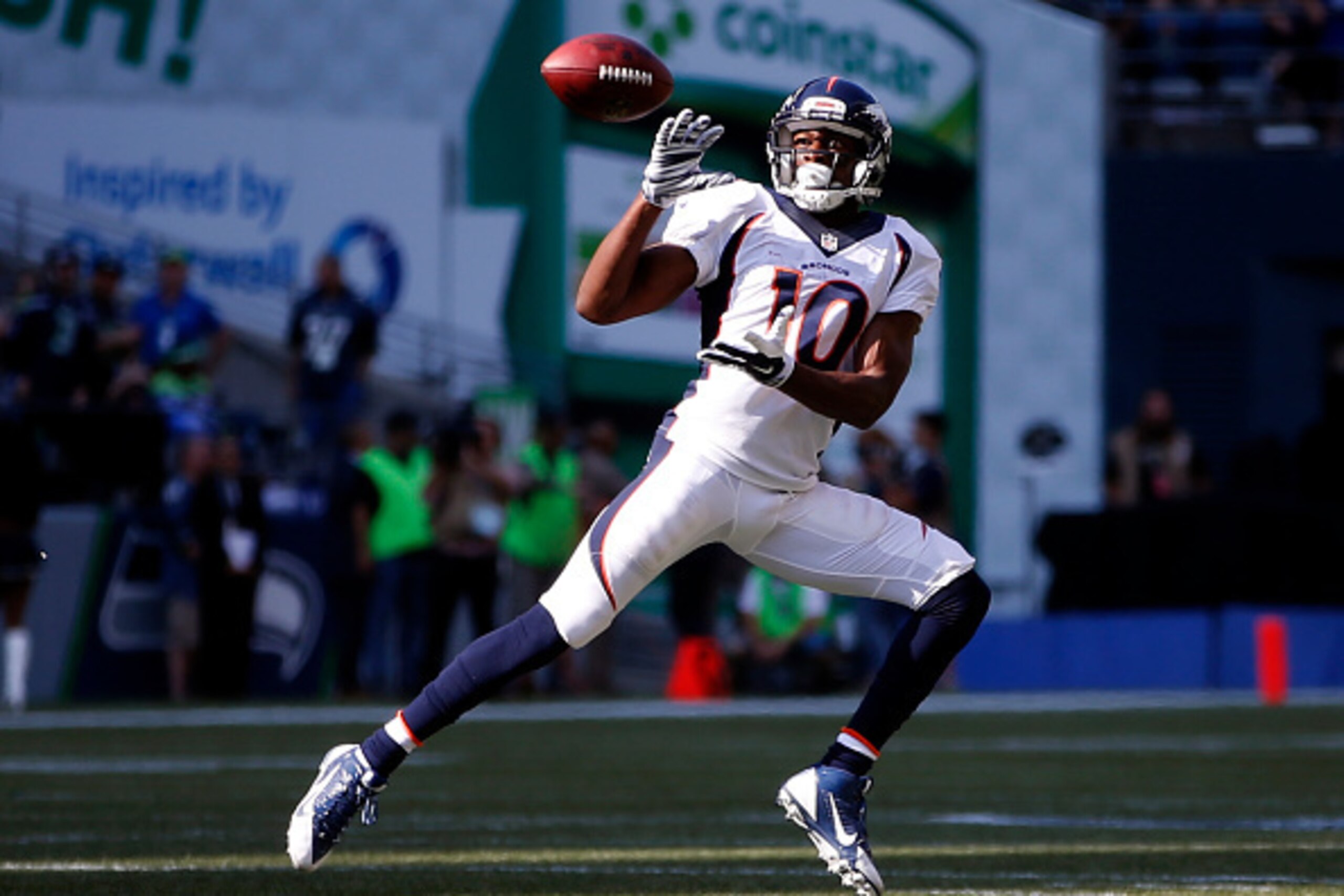 SEATTLE, WA - SEPTEMBER 21: Wide receiver Emmanuel Sanders #10 of the Denver Broncos catches the ball during the third quarter of the game against the Seattle Seahawks  at CenturyLink Field on September 21, 2014 in Seattle,Washington. (Photo by Otto Greul
