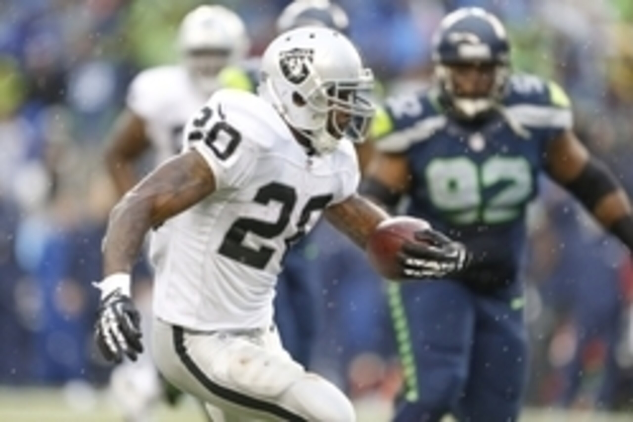 Nov 2, 2014; Seattle, WA, USA; Oakland Raiders running back Darren McFadden (20) rushes against the Seattle Seahawks during the third quarter at CenturyLink Field. Mandatory Credit: Joe Nicholson-USA TODAY Sports