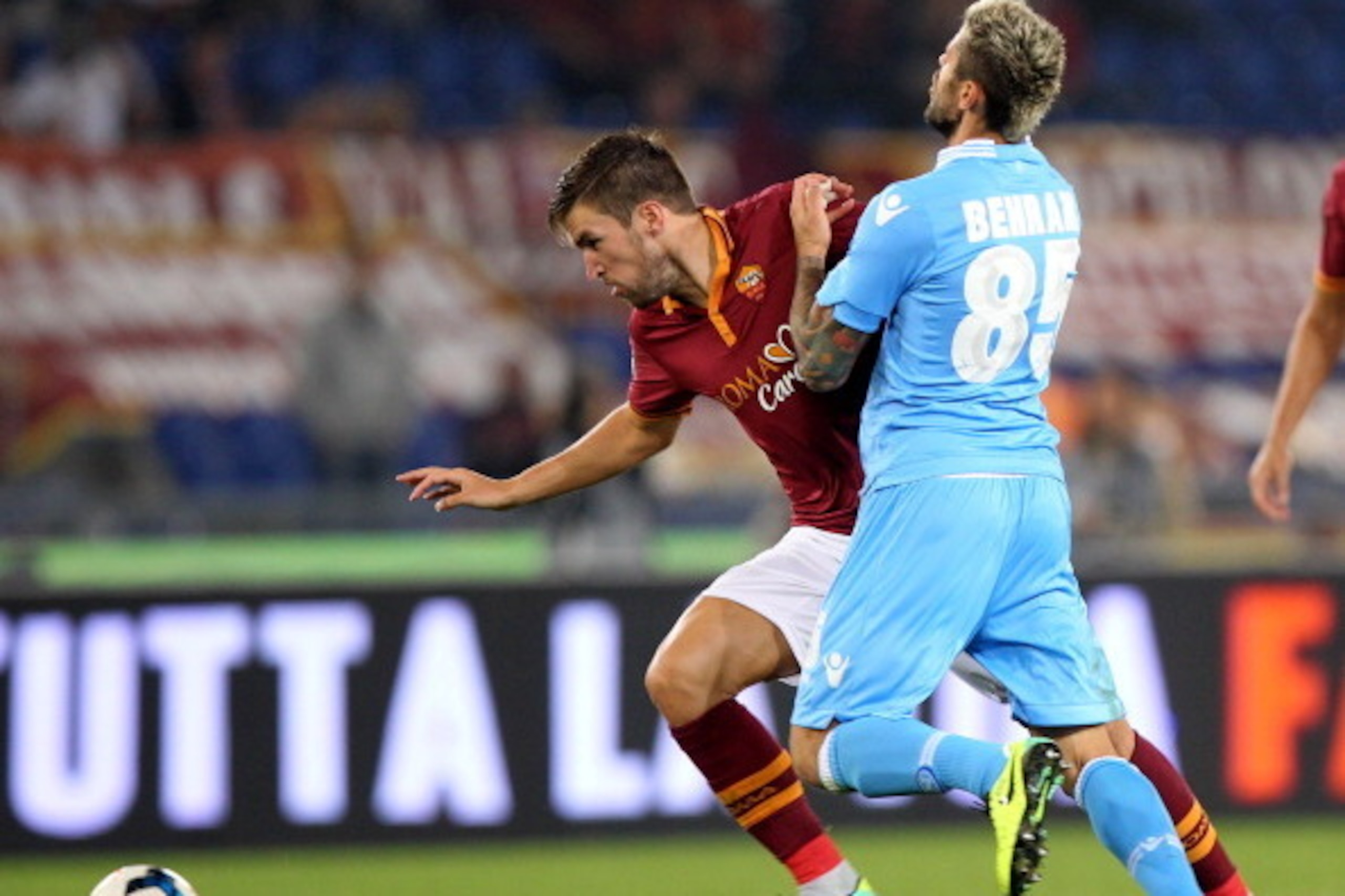 ROME, ITALY - OCTOBER 18: Valon Berhami (R) of SSC Napoli competes for the ball with Kevin Strootman of AS Roma during the Serie A match between AS Roma and SSC Napoli at Stadio Olimpico on October 18, 2013 in Rome, Italy. (Photo by Paolo Bruno/Getty Ima ROME, ITALY - OCTOBER 18: Valon Berhami (R) of SSC Napoli competes for the ball with Kevin Strootman of AS Roma during the Serie A match between AS Roma and SSC Napoli at Stadio Olimpico on October 18, 2013 in Rome, Italy. (Photo by Paolo Bruno/Getty Ima