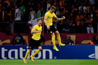 ISTANBUL, TURKEY - OCTOBER 22:  Marco Reus (R) of Borussia Dortmund celerates after scoring his team's third goal during UEFA Champions League Group D match between Galatasaray and Borussia Dortmund at Turk Telekom Arena on October 22, 2014 in Istanbul, T