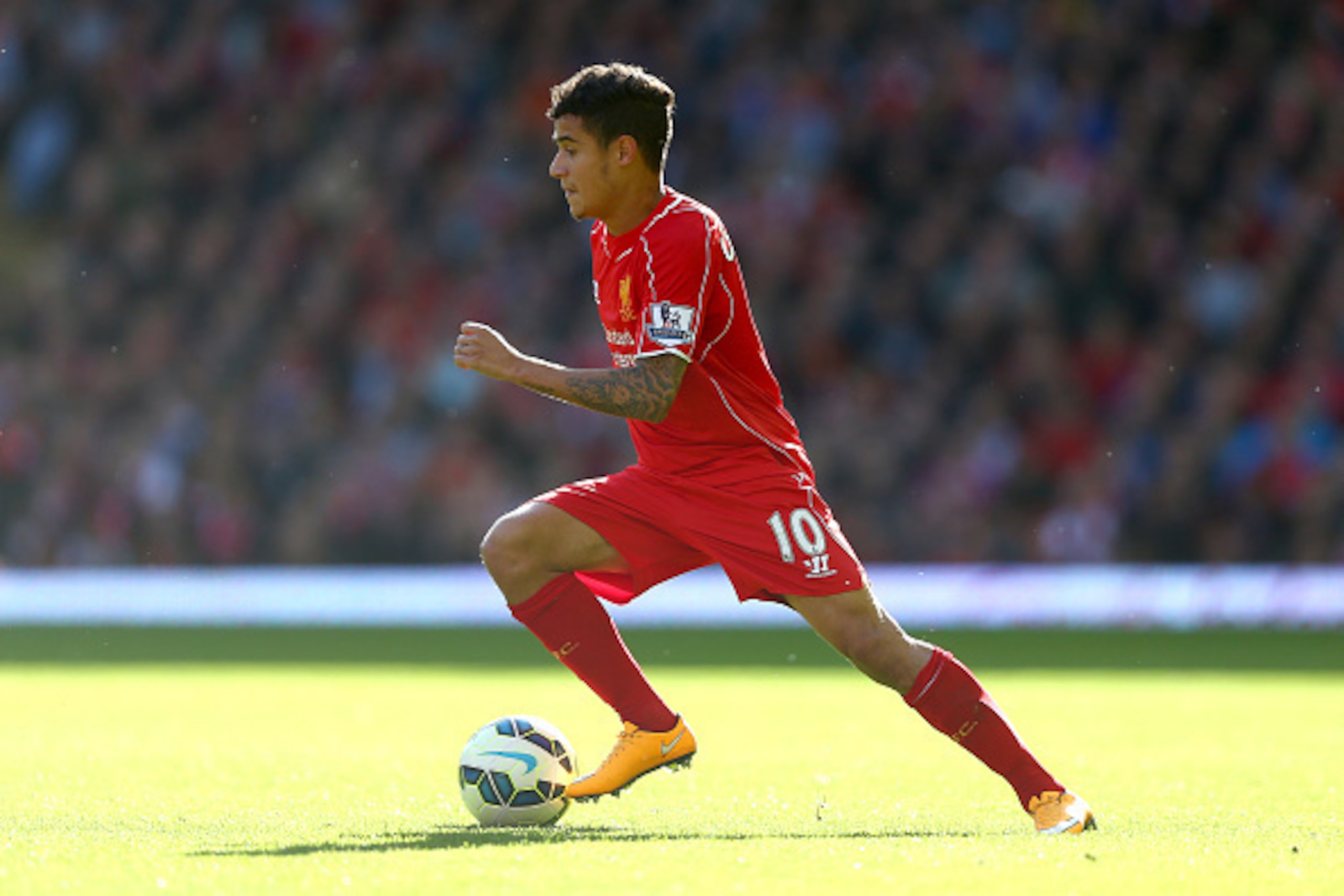 LIVERPOOL, ENGLAND - OCTOBER 04:  Philippe Coutinho of Liverpool in action during the Barclays Premier League match between Liverpool and West Bromwich Albion at Anfield on October 4, 2014 in Liverpool, England.  (Photo by Clive Brunskill/Getty Images)