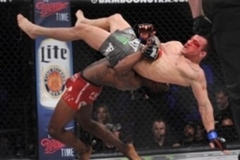 May 17, 2014; Southaven, MS, USA; Will Brooks fights against Michael Chandler during a Bellator interim lightweight world championship bout during BFC 120 at Landers Center. Will Brooks defeats Michael Chandler by submission. Mandatory Credit: Justin Ford