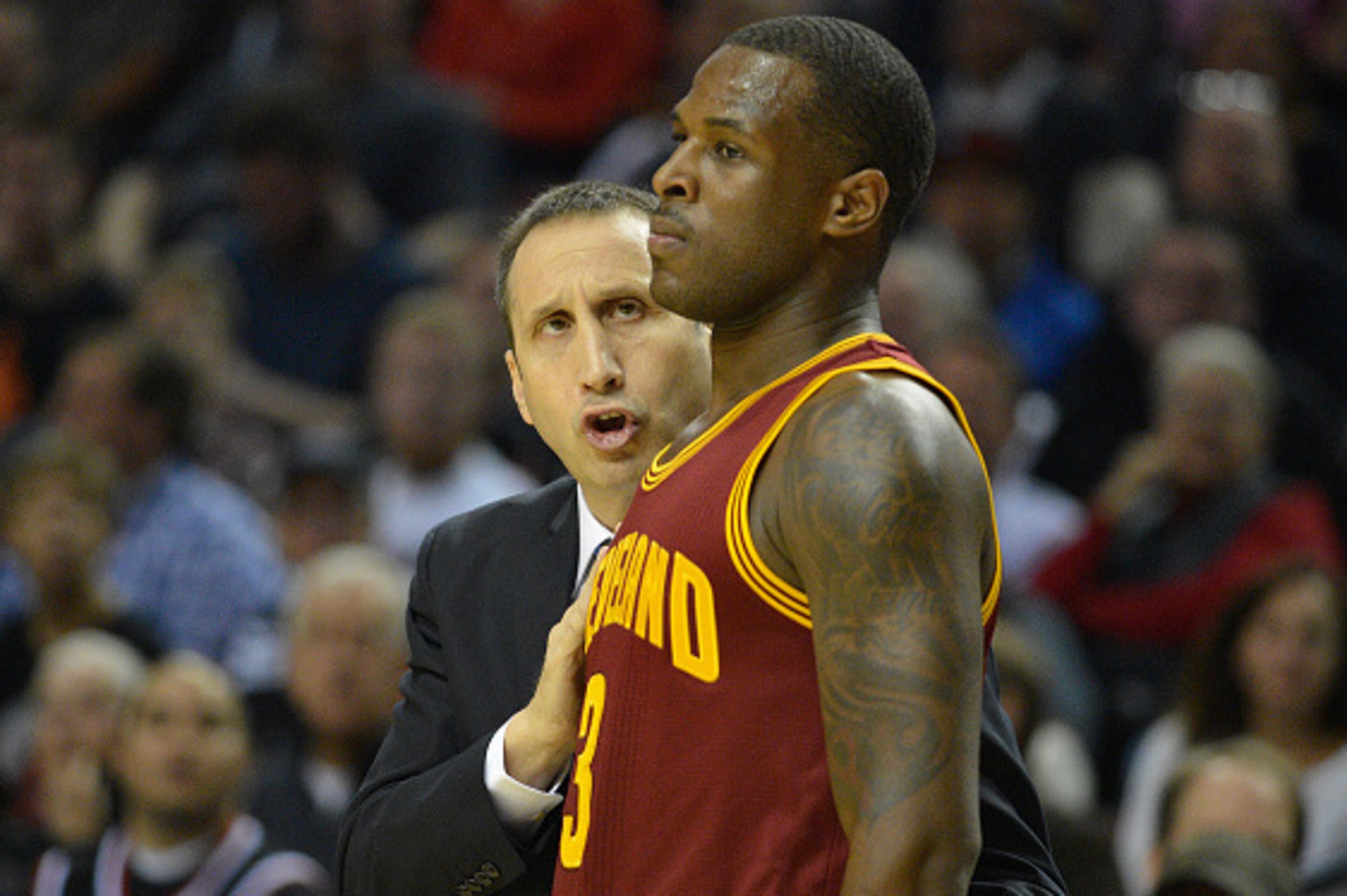 PORTLAND, OR - NOVEMBER 04: Head coach David Blatt of the Cleveland Cavaliers speaks with Dion Waiters #3 of the Cleveland Cavaliers during the second quarter of the game against the Portland Trail Blazers at Moda Center on November 4, 2014 in Portland, O