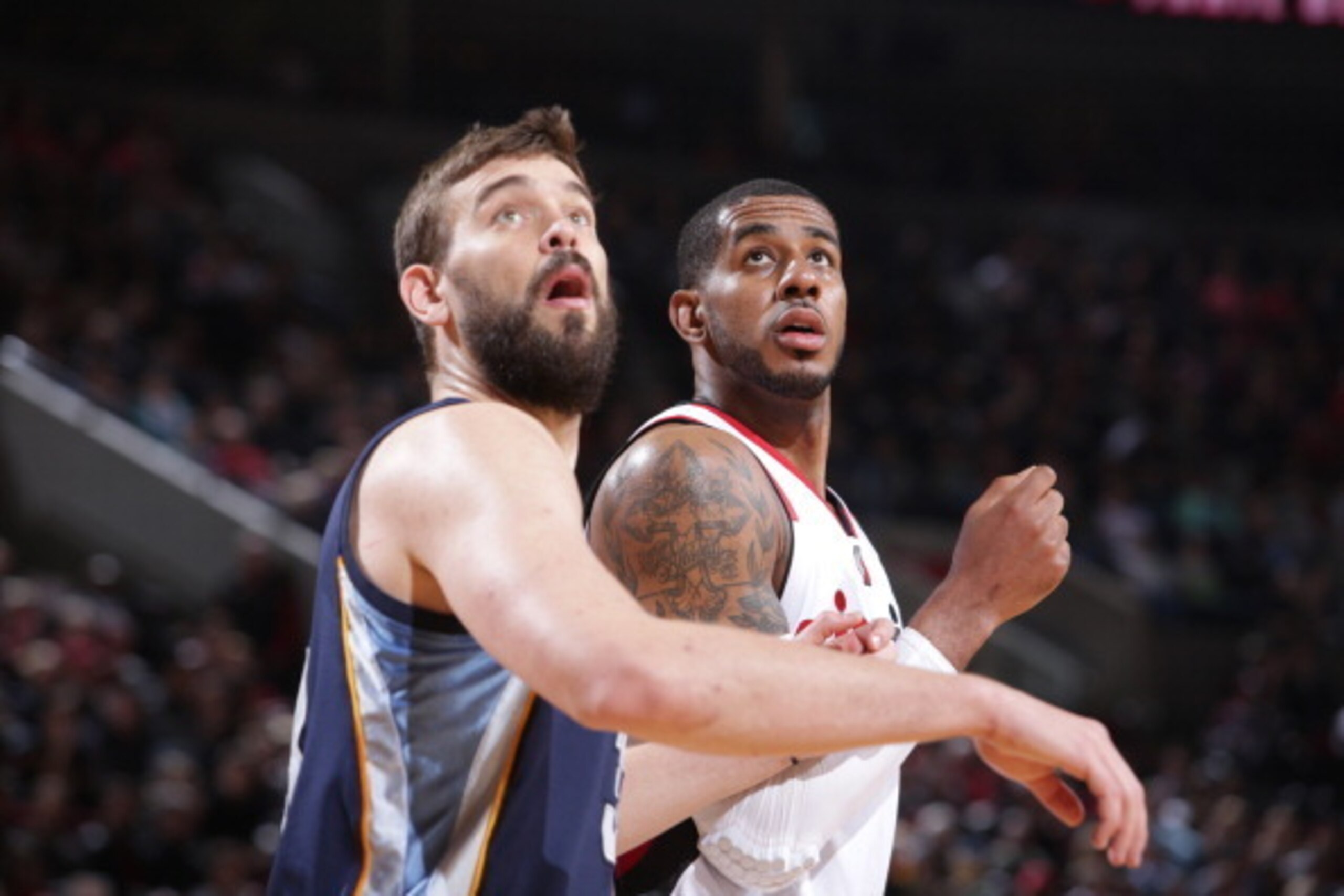 PORTLAND, OR - MARCH 30: Marc Gasol #33 of the Memphis Grizzlies boxes out LaMarcus Aldridge #12 of the Portland Trail Blazers on March 30, 2014 at the Moda Center Arena in Portland, Oregon. NOTE TO USER: User expressly acknowledges and agrees that, by d PORTLAND, OR - MARCH 30: Marc Gasol #33 of the Memphis Grizzlies boxes out LaMarcus Aldridge #12 of the Portland Trail Blazers on March 30, 2014 at the Moda Center Arena in Portland, Oregon. NOTE TO USER: User expressly acknowledges and agrees that, by d