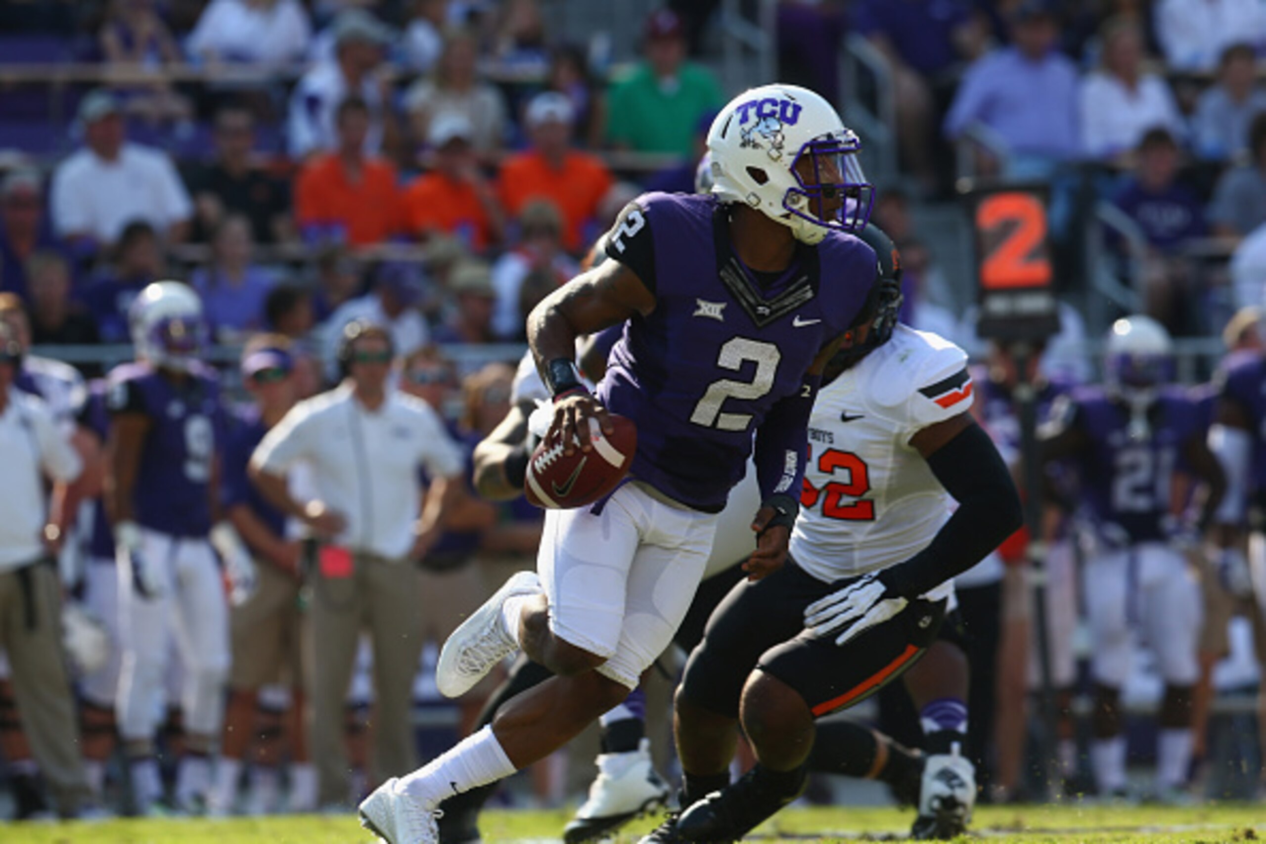 FORT WORTH, TX - OCTOBER 18:  Trevone Boykin #2 of the TCU Horned Frogs throws against the Oklahoma State Cowboys at Amon G. Carter Stadium on October 18, 2014 in Fort Worth, Texas.  (Photo by Ronald Martinez/Getty Images)
