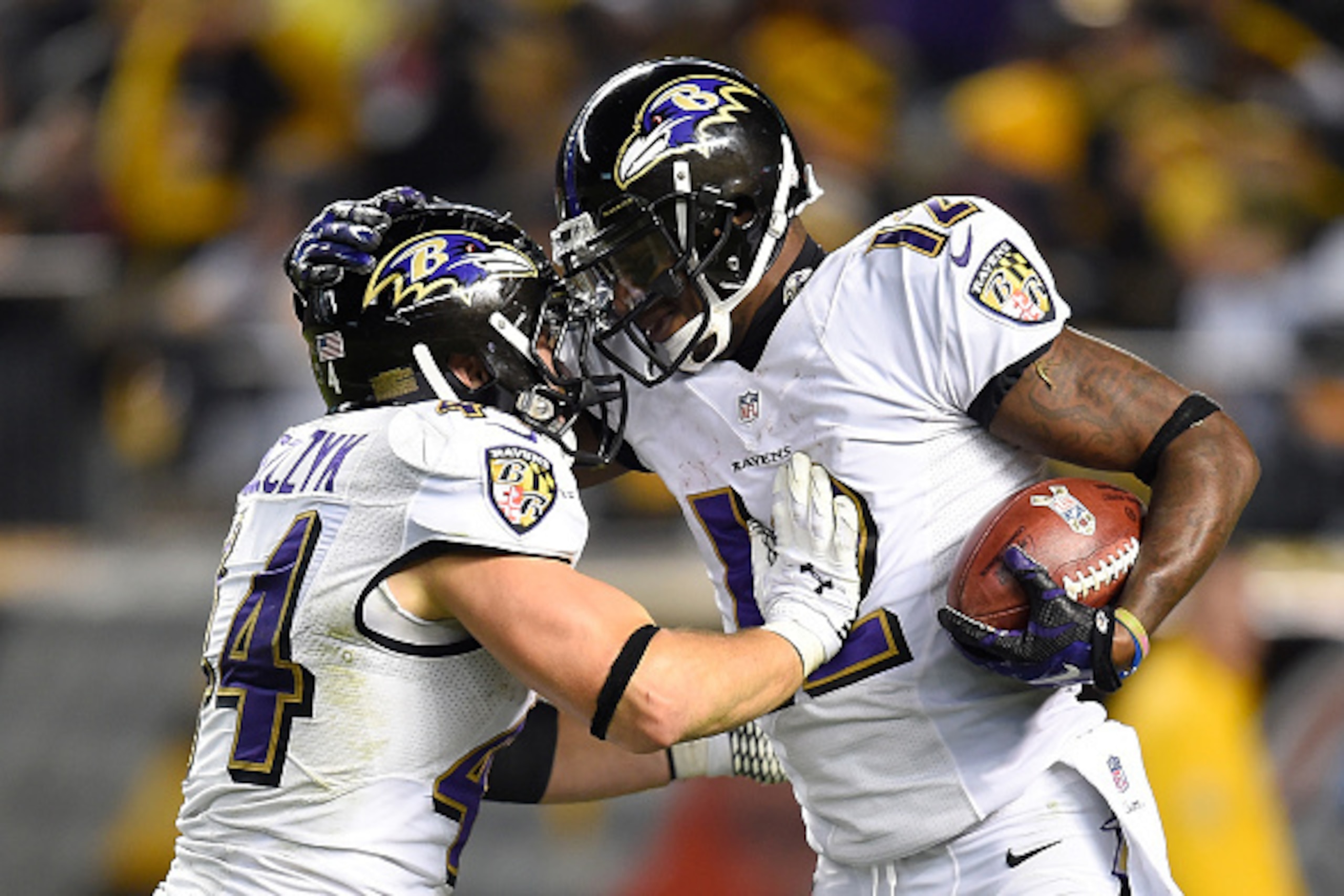 PITTSBURGH, PA - NOVEMBER 02:  Jacoby Jones #12 of the Baltimore Ravens celebrates his kickoff return for a touchdown with Kyle Juszczyk #44 during the fourth quarter against the Pittsburgh Steelers at Heinz Field on November 2, 2014 in Pittsburgh, Pennsy