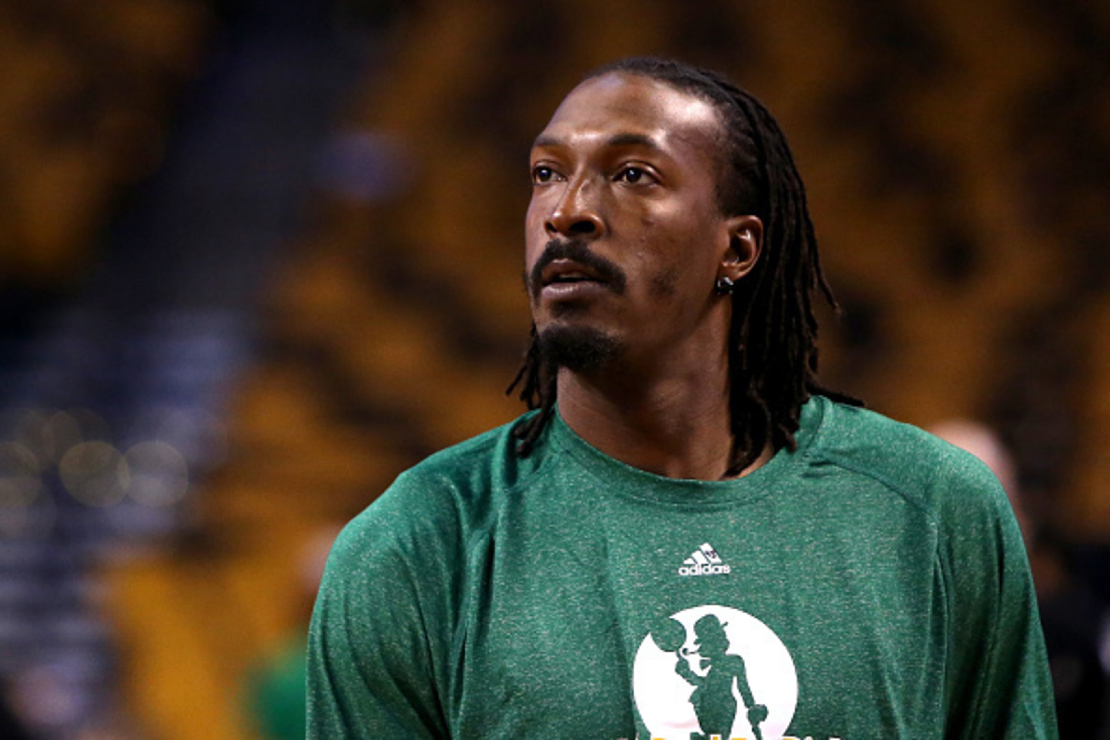 BOSTON, MA - NOVEMBER 05: Gerald Wallace #45 of the Boston Celtics looks on during warm ups prior to a game against the Toronto Raptors at TD Garden on November 5, 2014 in Boston, Massachusetts. NOTE TO USER: User expressly acknowledges and agrees that, b