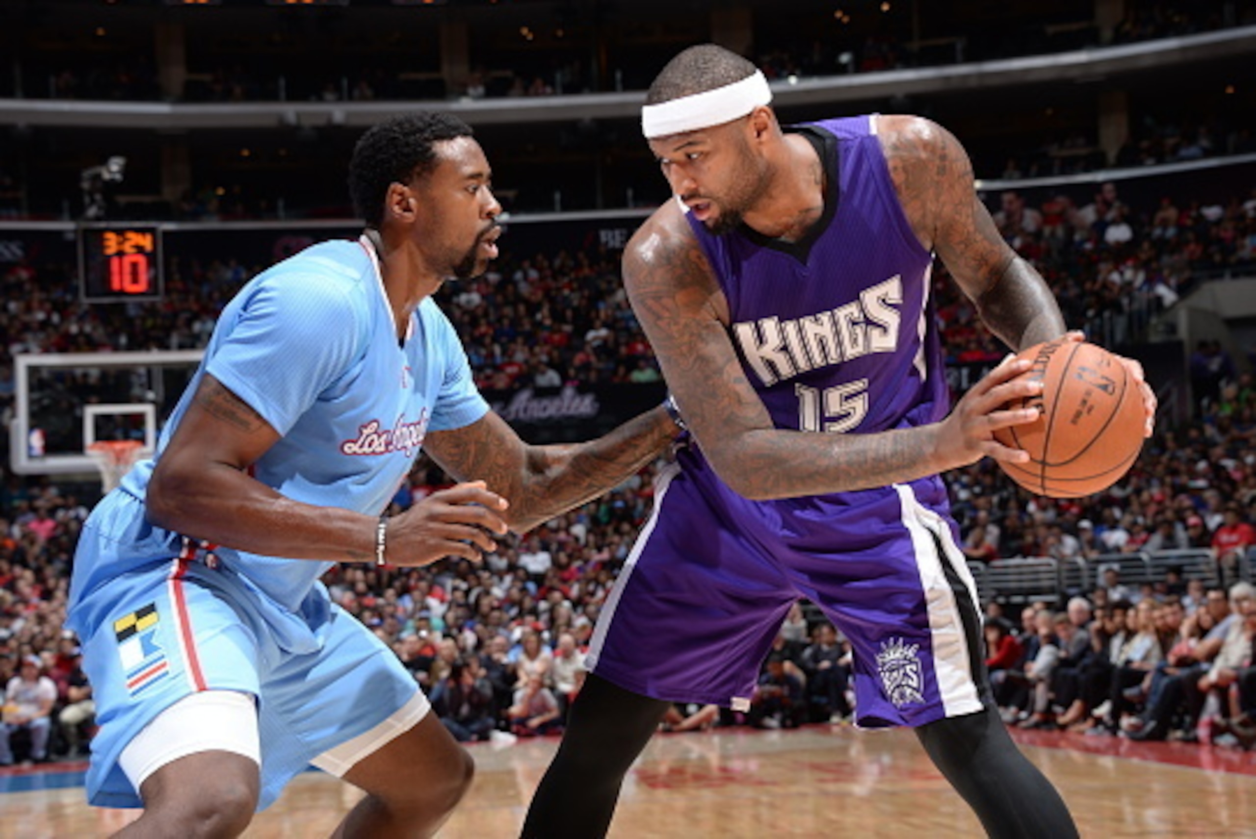 LOS ANGELES, CA - NOVEMBER 2:  DeMarcus Cousins #15 of the Sacramento Kings handles the ball against DeAndre Jordan #6 of the Los Angeles Clippers during a game on November 2, 2014 at STAPLES Center in Los Angeles, California. NOTE TO USER: User expressly