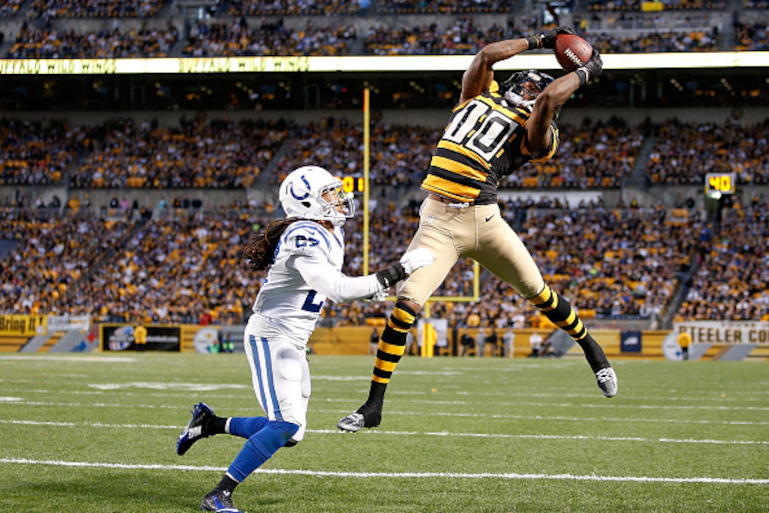 PITTSBURGH, PA - OCTOBER 26: Martavis Bryant #10 of the Pittsburgh Steelers catches his second touchdown of the game in front of Josh Gordy #27 of the Indianapolis Colts during the third quarter at Heinz Field on October 26, 2014 in Pittsburgh, Pennsylva PITTSBURGH, PA - OCTOBER 26: Martavis Bryant #10 of the Pittsburgh Steelers catches his second touchdown of the game in front of Josh Gordy #27 of the Indianapolis Colts during the third quarter at Heinz Field on October 26, 2014 in Pittsburgh, Pennsylva