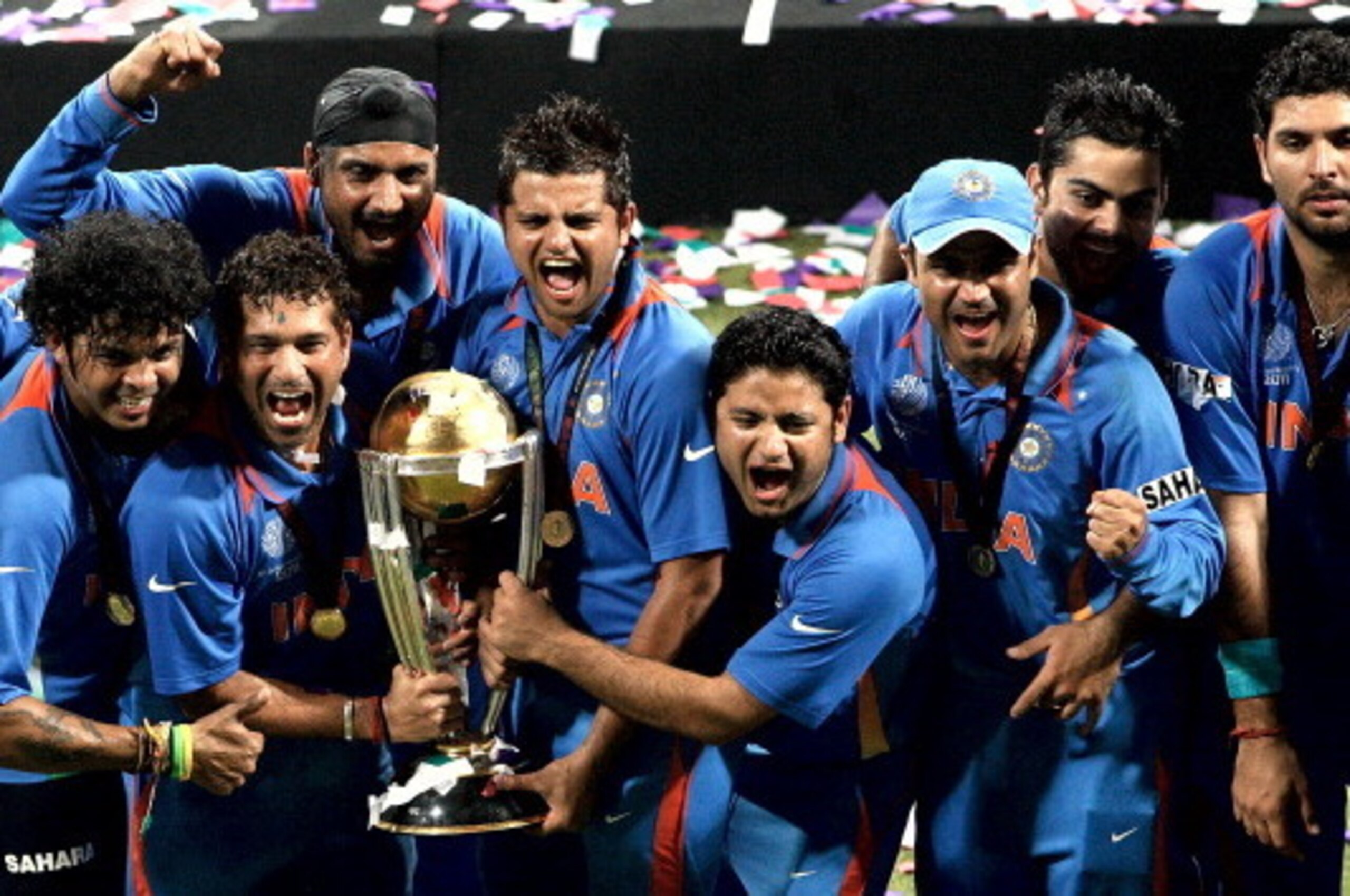 MUMBAI, INDIA - APRIL 02:  India players celebrate after India defeated Sri Lanka  in the 2011 ICC World Cup Final between India and Sri Lanka played at Wankhede Stadium on April 2, 2011 in Mumbai, India.  (Photo by Graham Crouch/Getty Images)