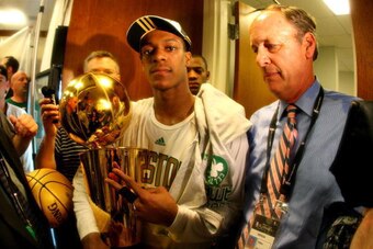 BOSTON - JUNE 17:  Rajon Rondo #9  of the Boston Celtics organization hold the Larry O'Brien championship trophy after defeating the Los Angeles Lakers 131-92 in Game Six of the 2008 NBA Finals on June 17, 2008 at the TD Banknorth Garden in Boston, Massac