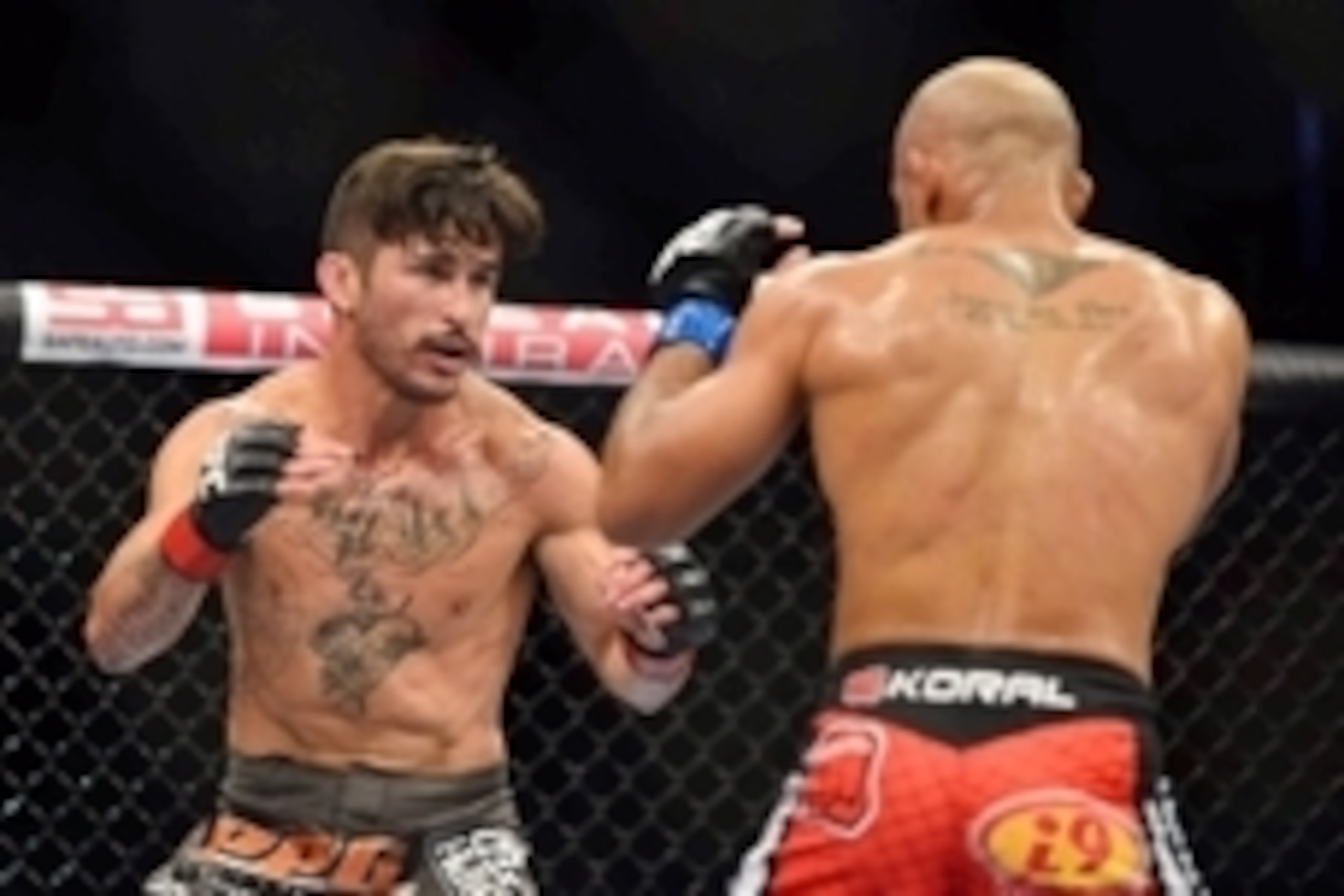 Aug 3, 2013; Rio De Janeiro, Brazil; Ian McCall (red gloves) and Iliarde Santos fight during UFC 163 at HSBC Arena. Mandatory Credit: Jason Silva-USA TODAY Sports