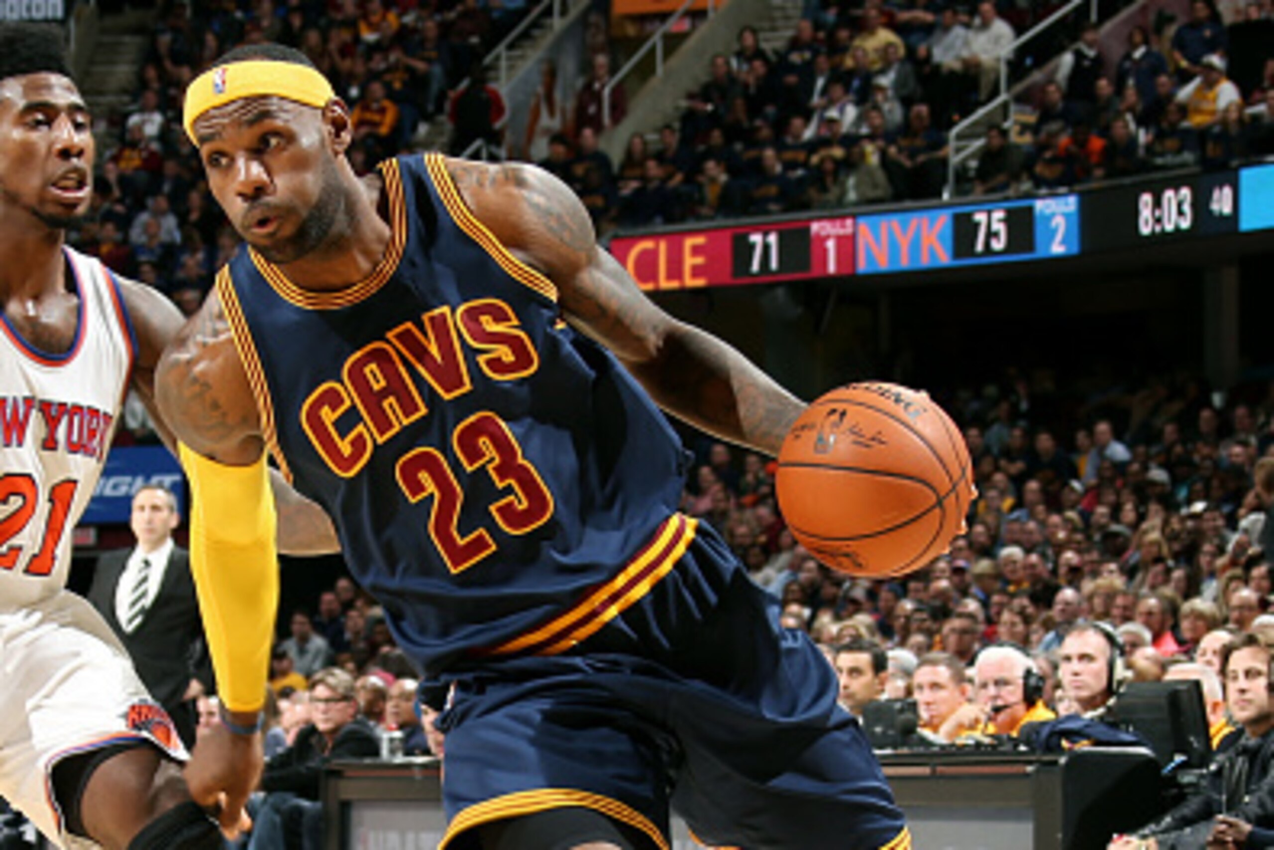 CLEVELAND, OH - OCTOBER 30: LeBron James #23 of the Cleveland Cavaliers drives against the New York Knicks on October 30, 2014 in Cleveland, Ohio. NOTE TO USER: User expressly acknowledges and agrees that, by downloading and/or using this photograph, user