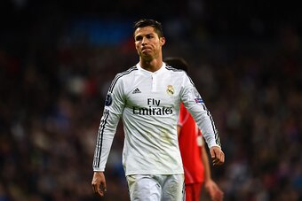 MADRID, SPAIN - NOVEMBER 04:  Cristiano Ronaldo of Real Madrid CF looks on during the UEFA Champions League Group B match between Real Madrid CF and Liverpool FC at Estadio Santiago Bernabeu on November 4, 2014 in Madrid, Spain.  (Photo by Shaun Botterill