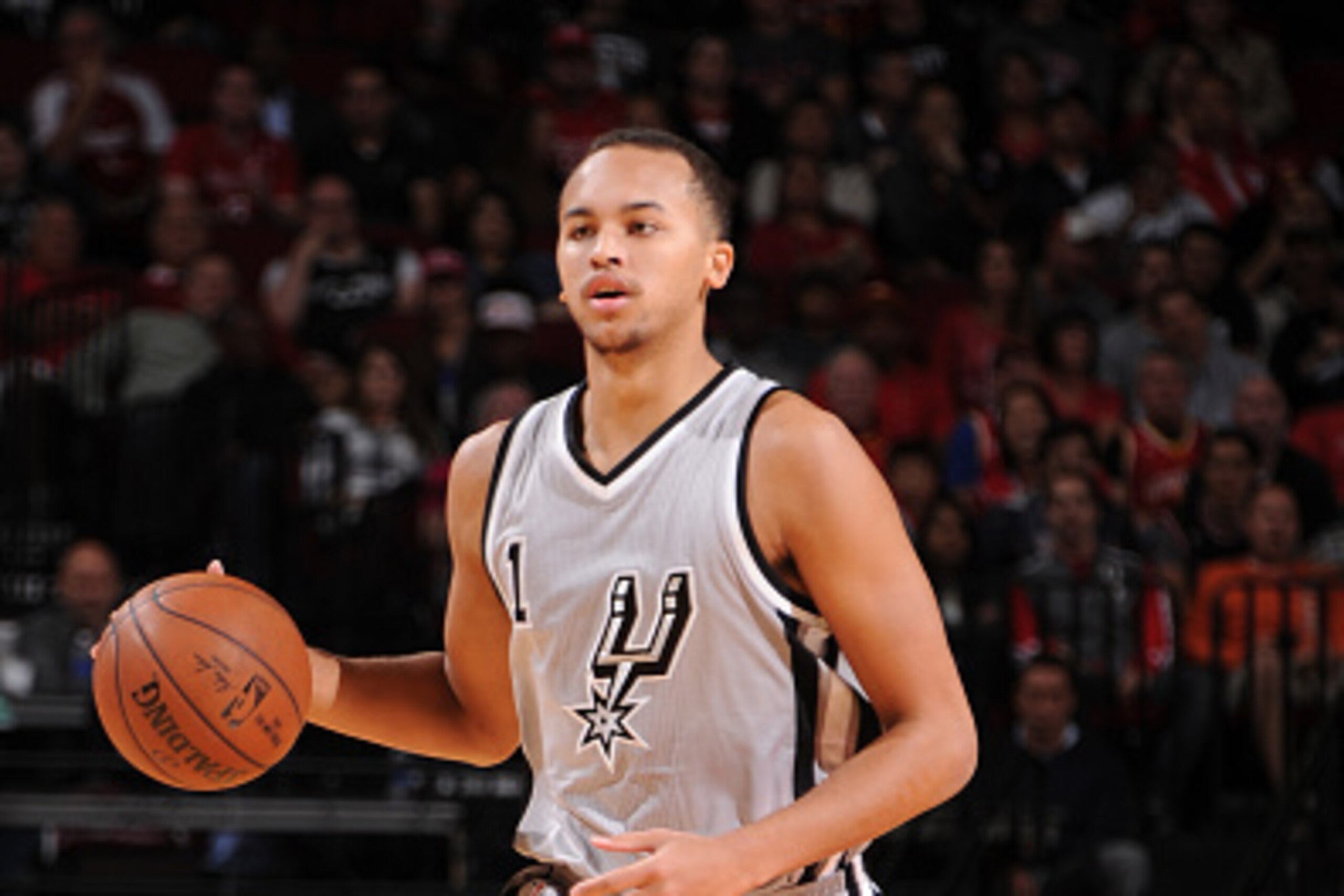 HOUSTON, TX - NOVEMBER 6:  Kyle Anderson #1 of the San Antonio Spurs handles the ball against the Houston Rockets on November 6, 2014 at the Toyota Center in Houston, Texas. NOTE TO USER: User expressly acknowledges and agrees that, by downloading and or 
