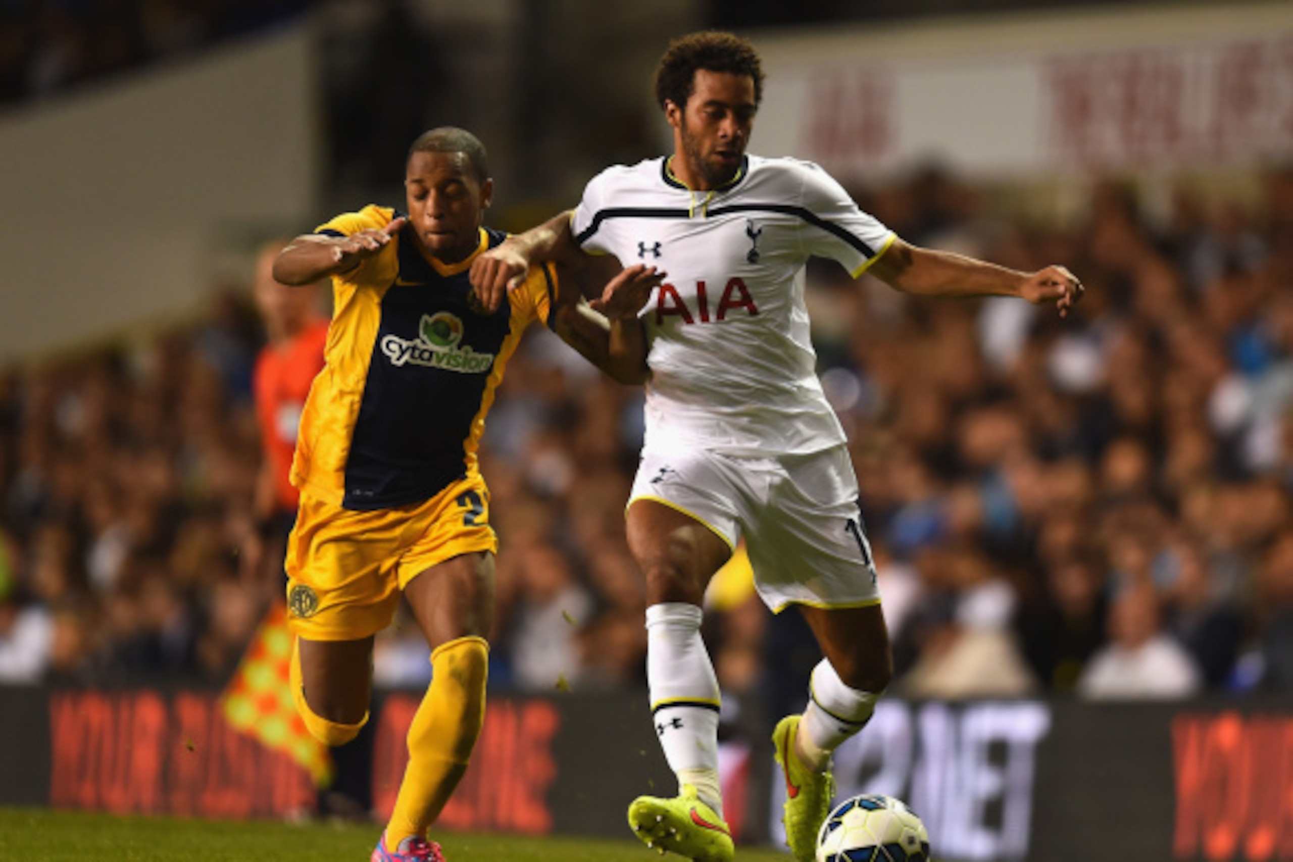 LONDON, ENGLAND - AUGUST 28:  Carlos Emanuel Soares Tavares of AEL Limassol and Mousa Dembele of Spurs battle for the ball during the UEFA Europa League Qualifying Play-Offs Round Second Leg match between Tottenham Hotspur and AEL Limassol FC on August 28