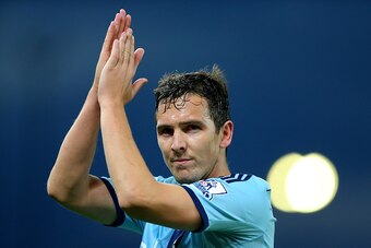 STOKE ON TRENT, ENGLAND - NOVEMBER 01:  Stewart Downing of West Ham saliutes the fans at the end of the Barclays Premier League match between Stoke City and West Ham United at the Britannia Stadium on November 1, 2014 in Stoke on Trent, England.  (Photo b