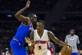 Nov 5, 2014; Auburn Hills, MI, USA; Detroit Pistons guard Kentavious Caldwell-Pope (5) moves the ball defended by New York Knicks guard Tim Hardaway Jr. (5) in the fourth quarter at The Palace of Auburn Hills. Detroit won 98-95. Mandatory Credit: Rick Ose