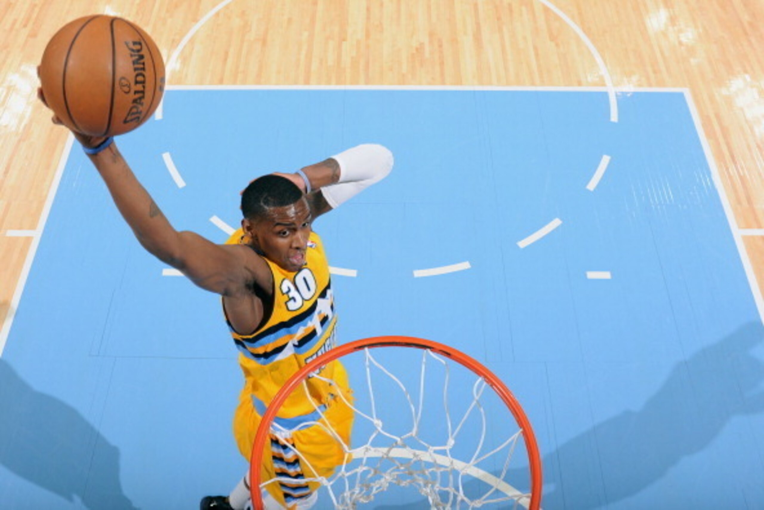 DENVER, CO - JANUARY 9: Quincy Miller #30 of the Denver Nuggets dunking during a game against the Oklahoma City Thunder on January 9, 2014 at the Pepsi Center in Denver, Colorado. NOTE TO USER: User expressly acknowledges and agrees that, by downloading a DENVER, CO - JANUARY 9: Quincy Miller #30 of the Denver Nuggets dunking during a game against the Oklahoma City Thunder on January 9, 2014 at the Pepsi Center in Denver, Colorado. NOTE TO USER: User expressly acknowledges and agrees that, by downloading a