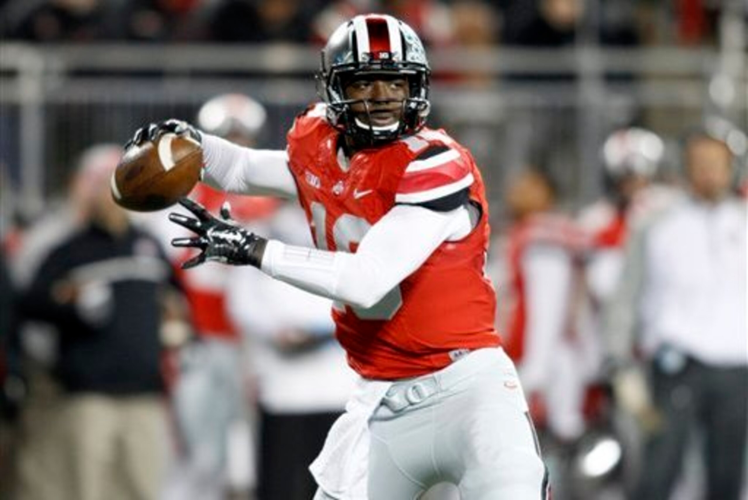 J.T. Barrett leads in the Big Ten in total yardage and touchdowns through eight games.