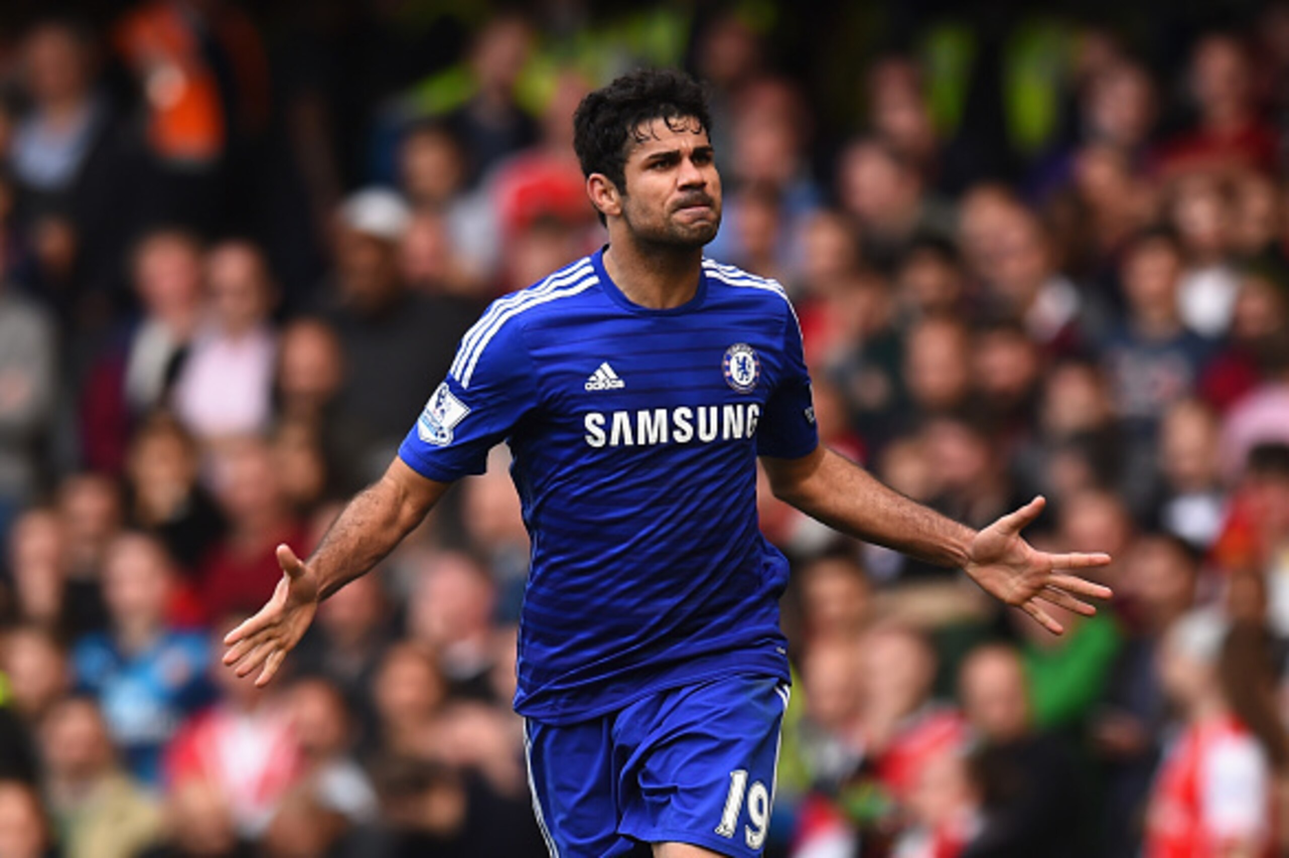 LONDON, ENGLAND - OCTOBER 05:  Diego Costa of Chelsea celebrates scoring their second goalduring the Barclays Premier League match between Chelsea and Arsenal at Stamford Bridge on October 4, 2014 in London, England.  (Photo by Shaun Botterill/Getty Image