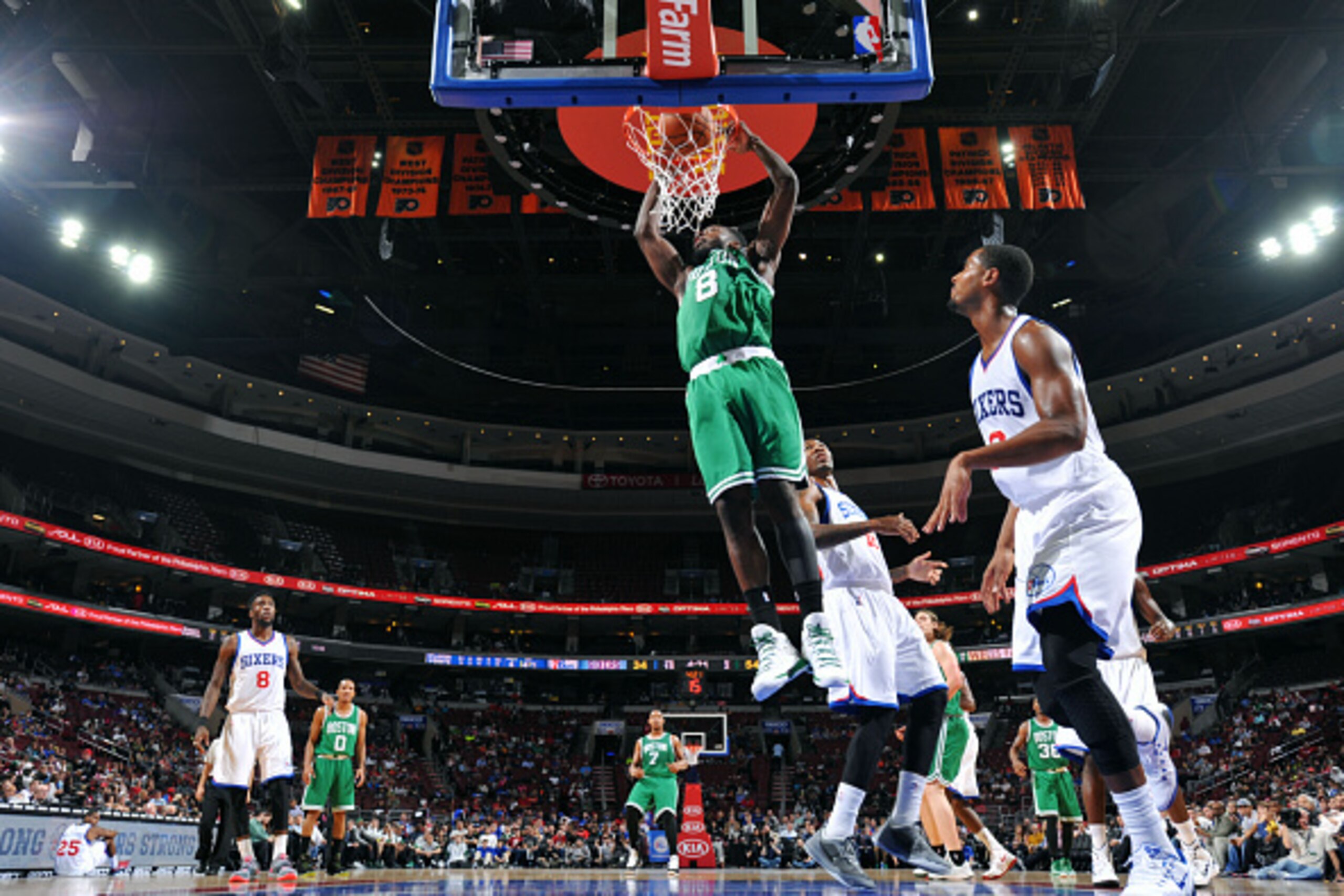 PHILADELPHIA, PA - OCTOBER 16: Jeff Green #8 of the Boston Celtics dunks against the Philadelphia 76ers on October 16, 2014 at Wells Fargo Center in Philadelphia, Pennsylvania. NOTE TO USER: User expressly acknowledges and agrees that, by downloading and 