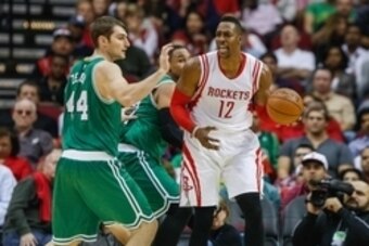 Nov 1, 2014; Houston, TX, USA; Houston Rockets center Dwight Howard (12) and Boston Celtics center Tyler Zeller (44) during the game at Toyota Center. Mandatory Credit: Troy Taormina-USA TODAY Sports
