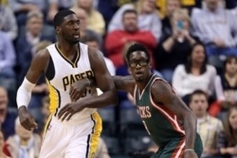 Nov 4, 2014; Indianapolis, IN, USA; Indiana Pacers center Roy Hibbert (55) posts up against Milwaukee Bucks center Larry Sanders (8) at Bankers Life Fieldhouse. Mandatory Credit: Brian Spurlock-USA TODAY Sports