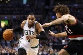 Nov 15, 2013; Boston, MA, USA; Boston Celtics power forward Jared Sullinger (7) drives to the hoop against Portland Trail Blazers center Robin Lopez (42) during the second half at TD Garden. Mandatory Credit: Mark L. Baer-USA TODAY Sports