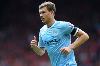 LIVERPOOL, ENGLAND - APRIL 13:  Edin Dzeko of Manchester City in action during the Barclays Premier League match between Liverpool and Manchester City at Anfield on April 13, 2014 in Liverpool, England.  (Photo by Alex Livesey/Getty Images)