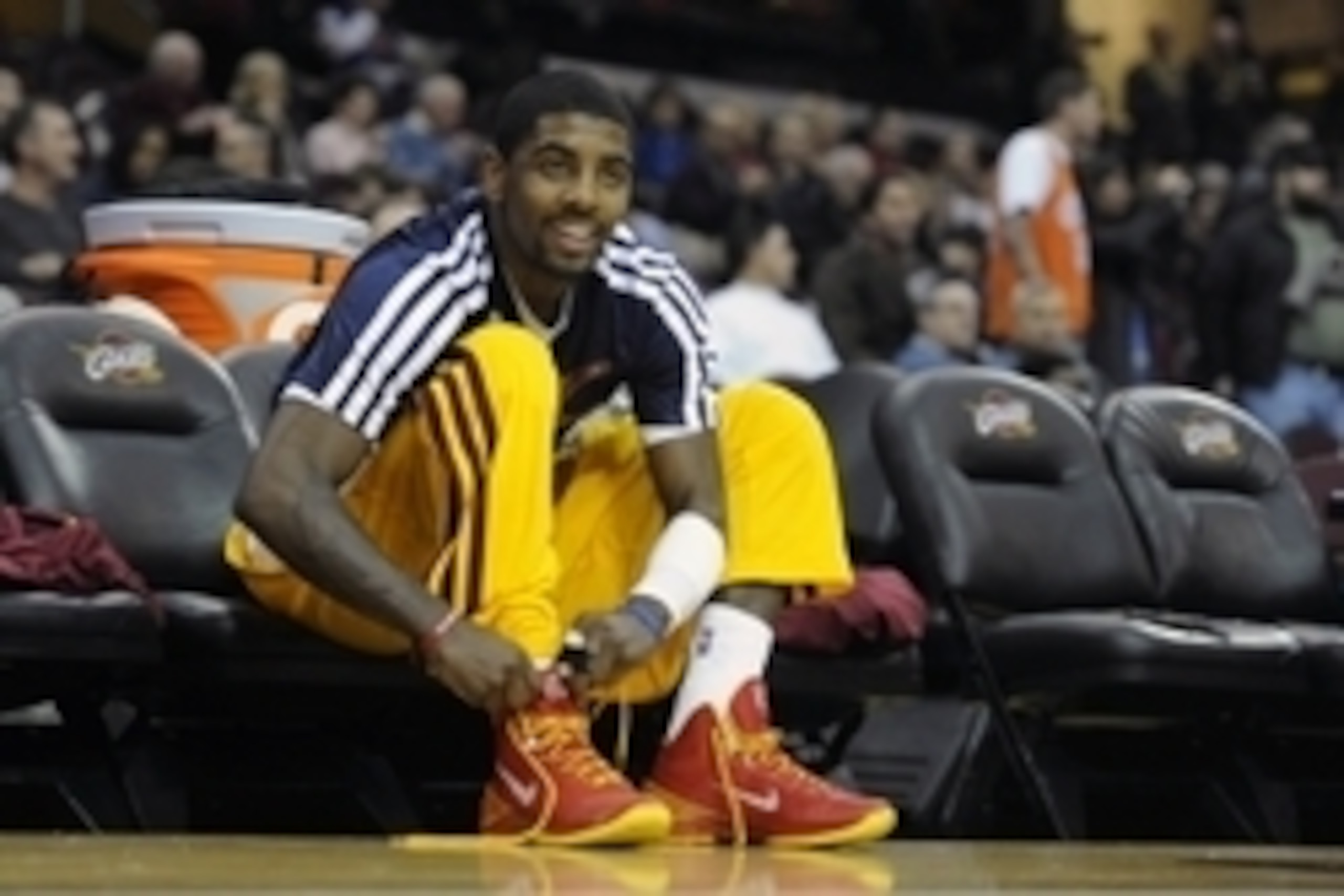 Dec 10, 2013; Cleveland, OH, USA; Cleveland Cavaliers point guard Kyrie Irving ties his shoe prior to a game against the New York Knicks at Quicken Loans Arena. Mandatory Credit: David Richard-USA TODAY Sports