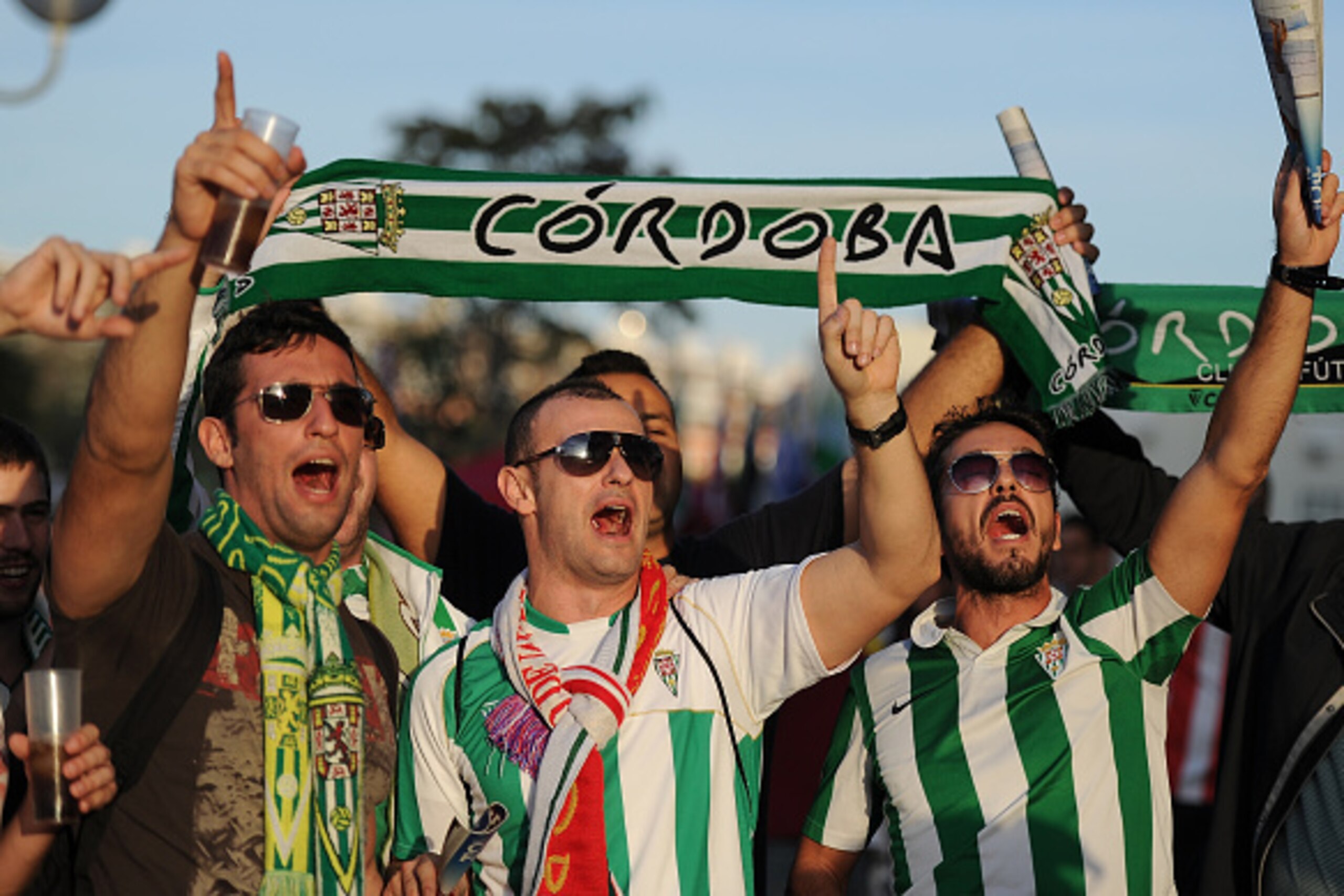 MADRID, SPAIN - NOVEMBER 01:  Cordoba CF fans cheer prior to the La Liga match between Club Atletico de Madrid and Cordoba CF outside Vicente Calderon Stadium on November 1, 2014 in Madrid, Spain.  (Photo by Denis Doyle/Getty Images)