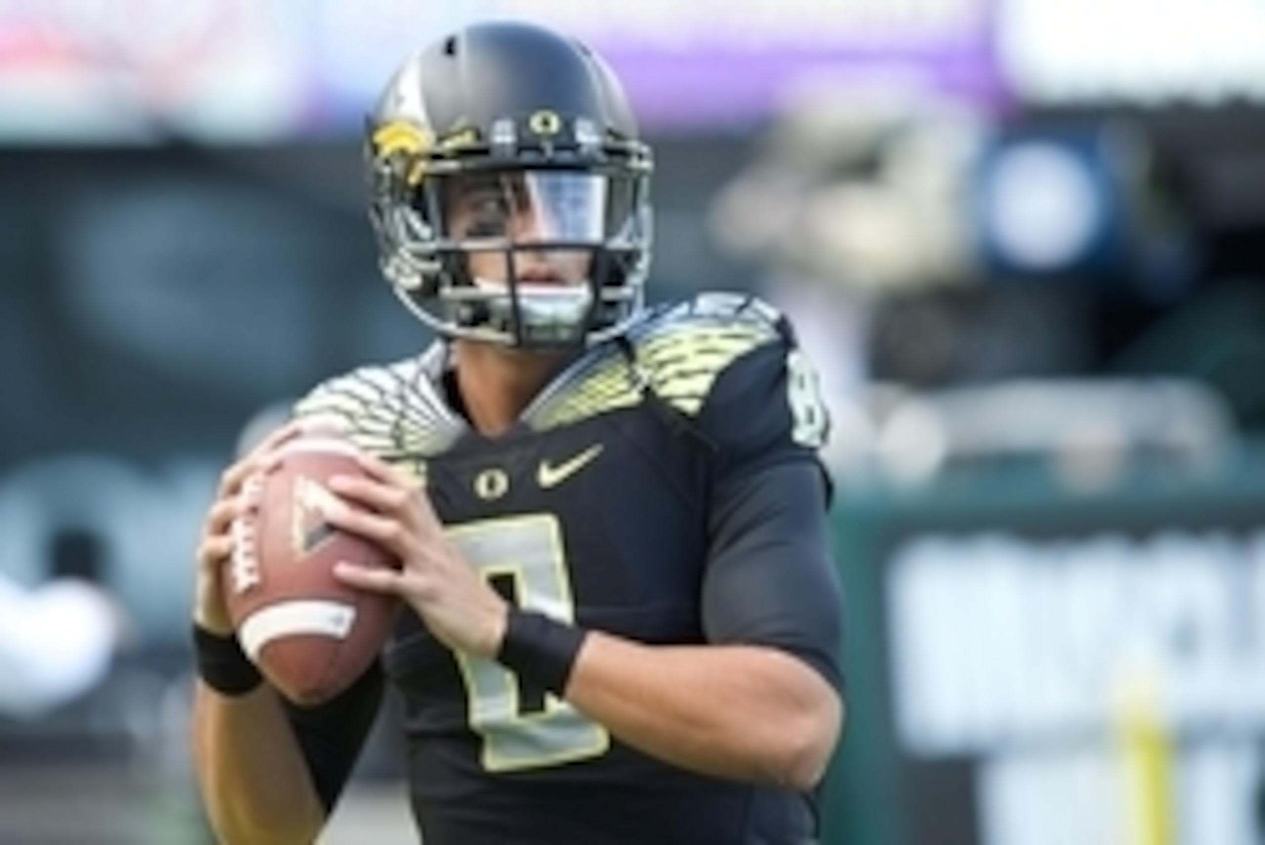 Nov 1, 2014; Eugene, OR, USA; Oregon Ducks quarterback Marcus Mariota (8) throws the ball before the game against the Stanford Cardinal at Autzen Stadium. Mandatory Credit: Scott Olmos-USA TODAY Sports