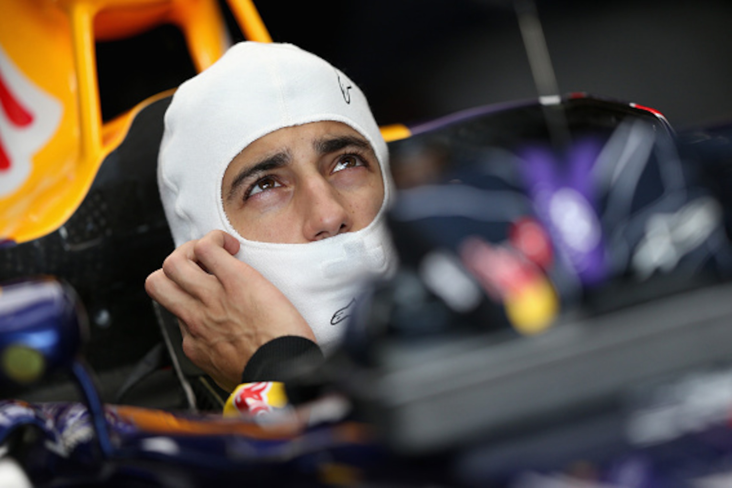 SAO PAULO, BRAZIL - NOVEMBER 07:  Daniel Ricciardo of Australia and Infiniti Red Bull Racing prepares in the car during practice ahead of the Brazilian Formula One Grand Prix at Autodromo Jose Carlos Pace on November 7, 2014 in Sao Paulo, Brazil.  (Photo 