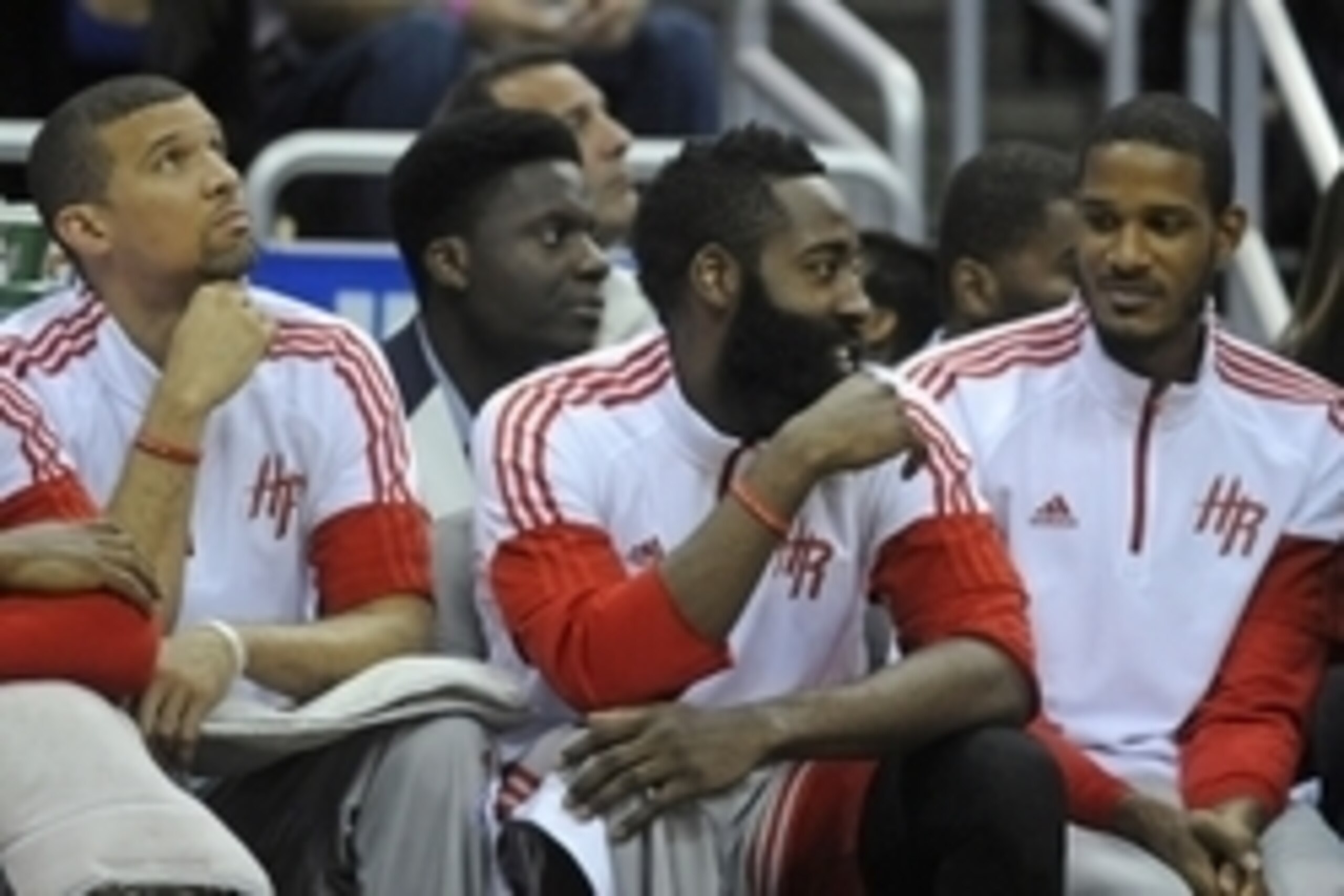 Oct 22, 2014; Orlando, FL, USA; Houston Rockets guard James Harden, center, laughs on the bench as the Rockets beat the Orlando Magic 90-89 at Amway Center. Mandatory Credit: David Manning-USA TODAY Sports