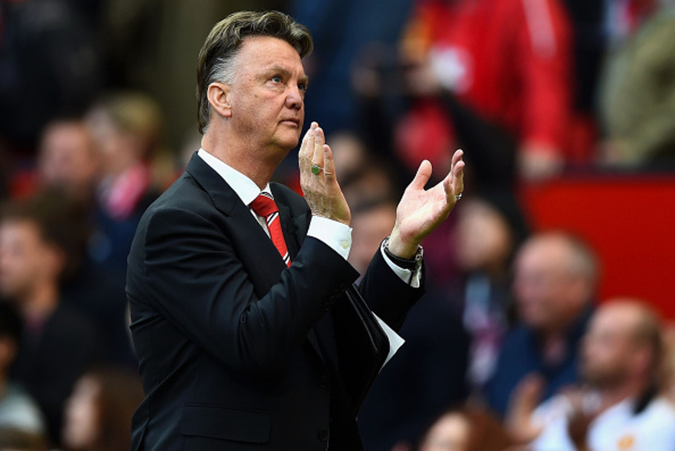 MANCHESTER, ENGLAND - SEPTEMBER 27: Louis van Gaal the manager of Manchester United applauds the fans following his team's 2-1 victory during the Barclays Premier League match between Manchester United and West Ham United at Old Trafford on September 27, MANCHESTER, ENGLAND - SEPTEMBER 27: Louis van Gaal the manager of Manchester United applauds the fans following his team's 2-1 victory during the Barclays Premier League match between Manchester United and West Ham United at Old Trafford on September 27,