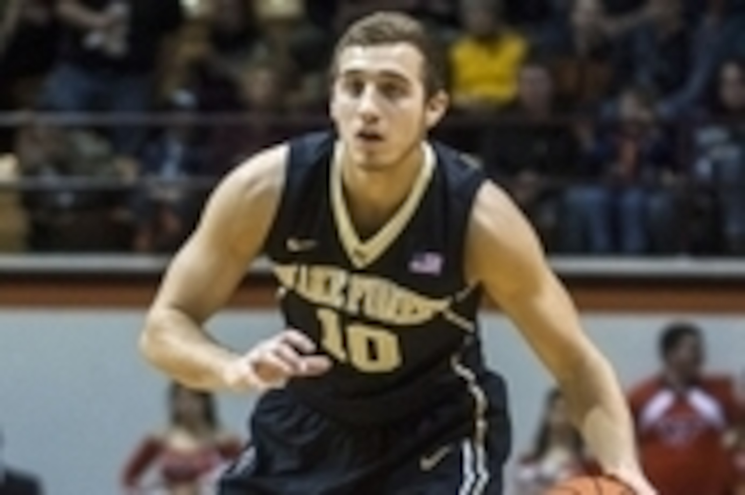 Jan 19, 2013; Blacksburg, VA, USA; Wake Forest Demon Deacons guard Chase Fischer (10) handles the ball against the Virginia Tech Hokies at Cassell Coliseum. Mandatory Credit: Peter Casey-USA TODAY Sports