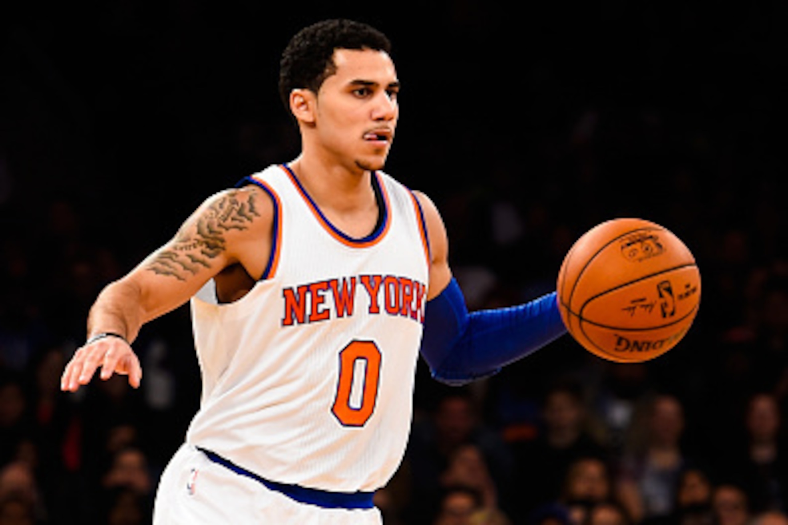 NEW YORK, NY - OCTOBER 13: Shane Larkin #0 of the New York Knicks dribbles down the court during a game against the Toronto Raptors at Madison Square Garden on October 13, 2014 in New York City. NOTE TO USER: User expressly acknowledges and agrees that, b